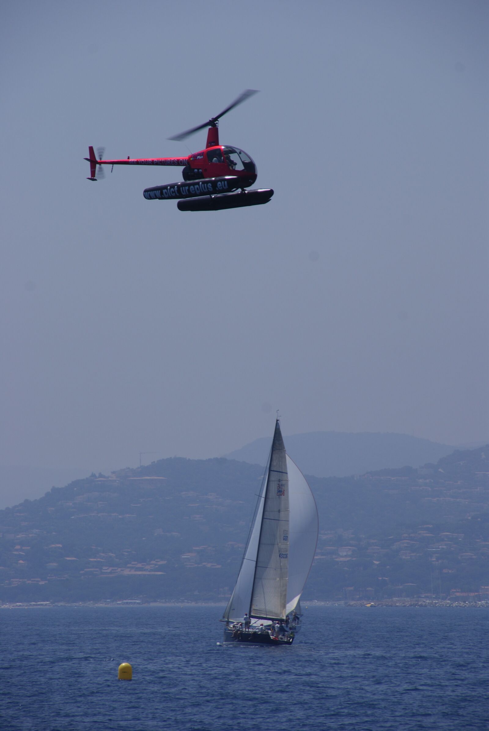 Sony Alpha DSLR-A300 sample photo. Helicopter, sailing boat, sea photography