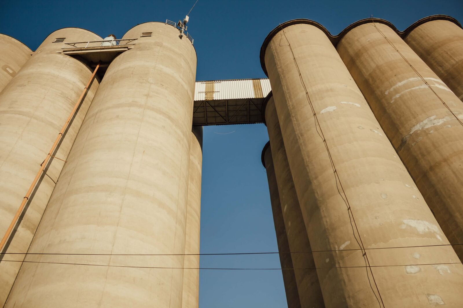Canon EF-S 18-55mm F3.5-5.6 IS sample photo. Silo, warehouse, buildings, storage photography