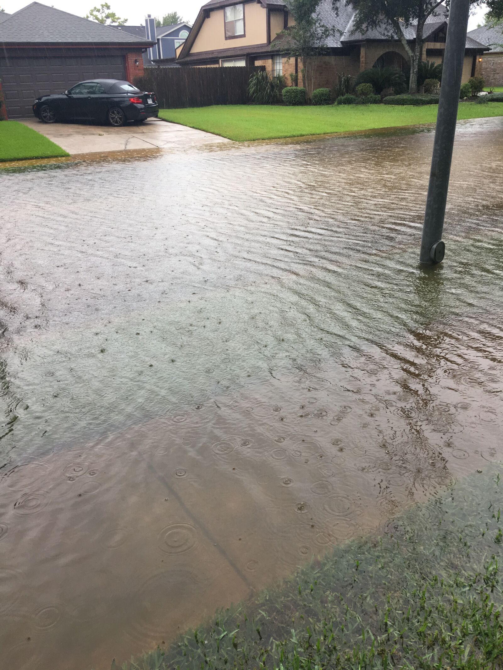 iPhone 6s Plus back camera 4.15mm f/2.2 sample photo. Flood, street flooding, water photography