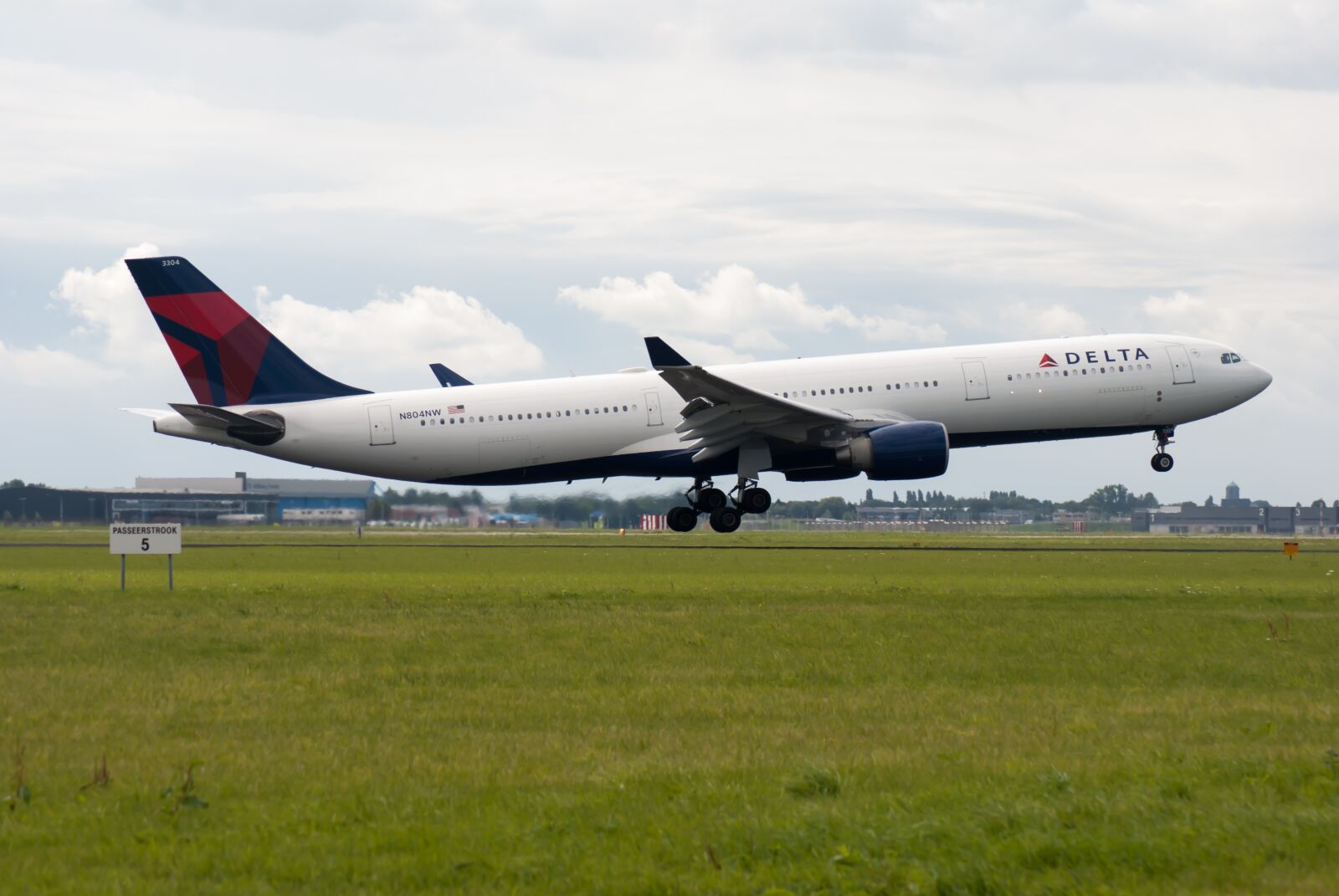 Nikon D3000 sample photo. Plane, runway, airline photography