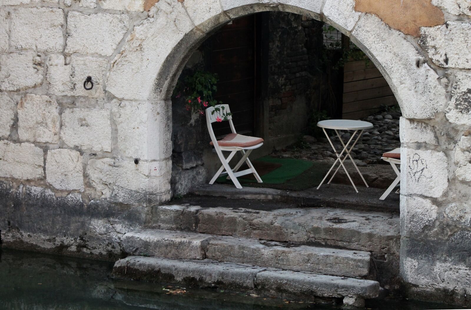 Canon EF 75-300mm f/4-5.6 sample photo. Chairs, terrace, water photography