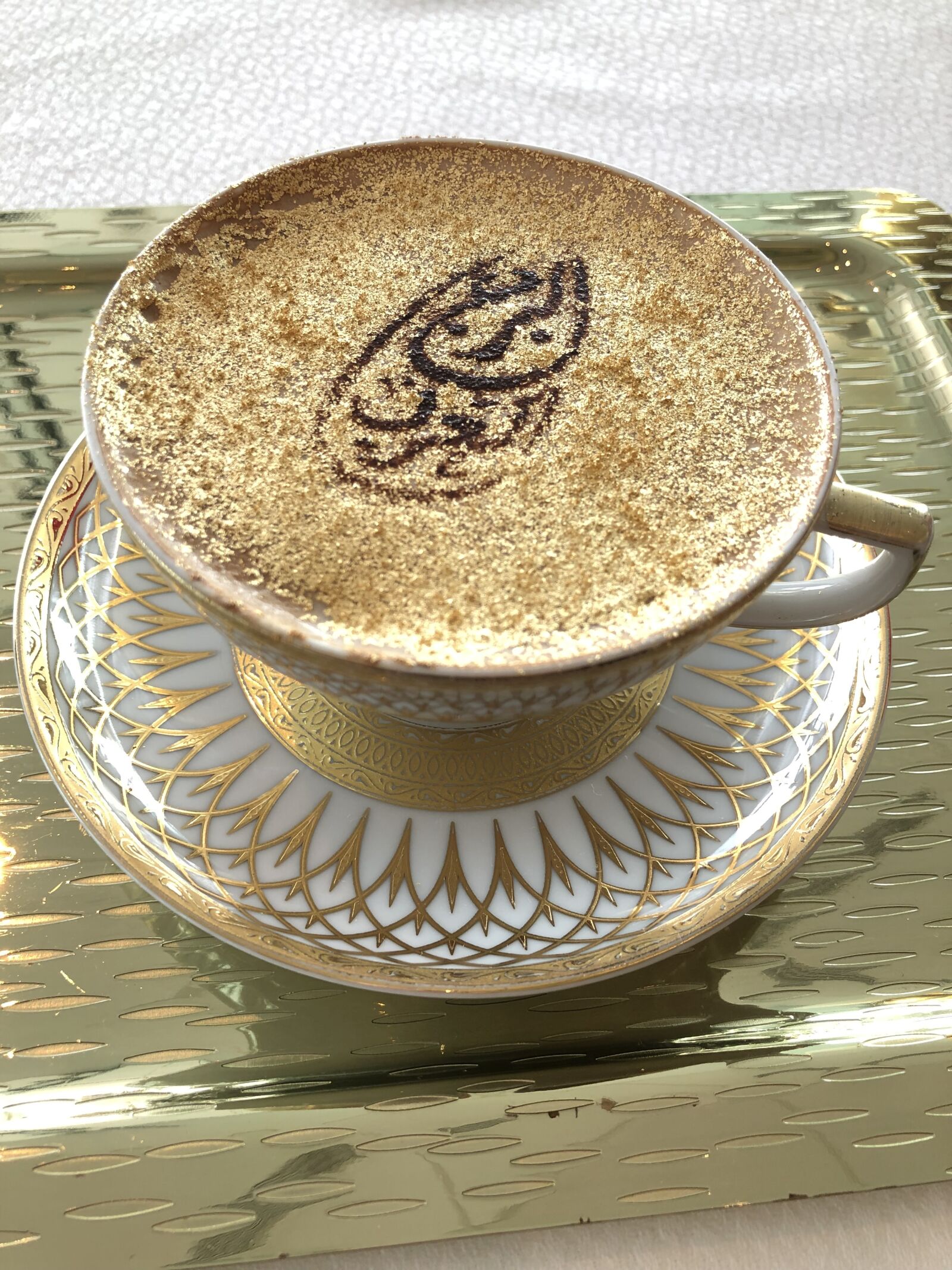iPhone X back dual camera 4mm f/1.8 sample photo. Golden coffee, coffee burj photography