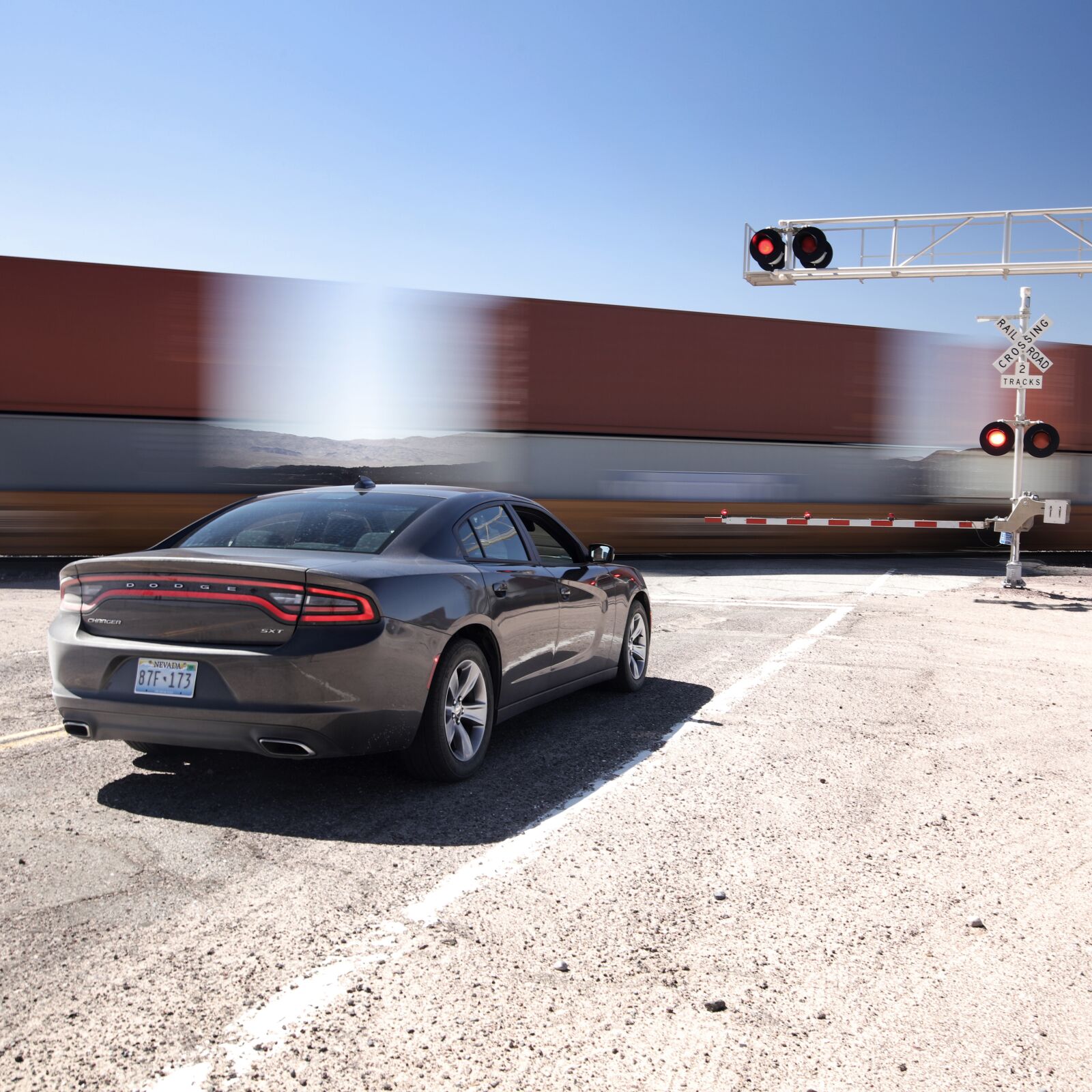 Canon EOS 5D Mark IV sample photo. Train, cabinets, level crossing photography