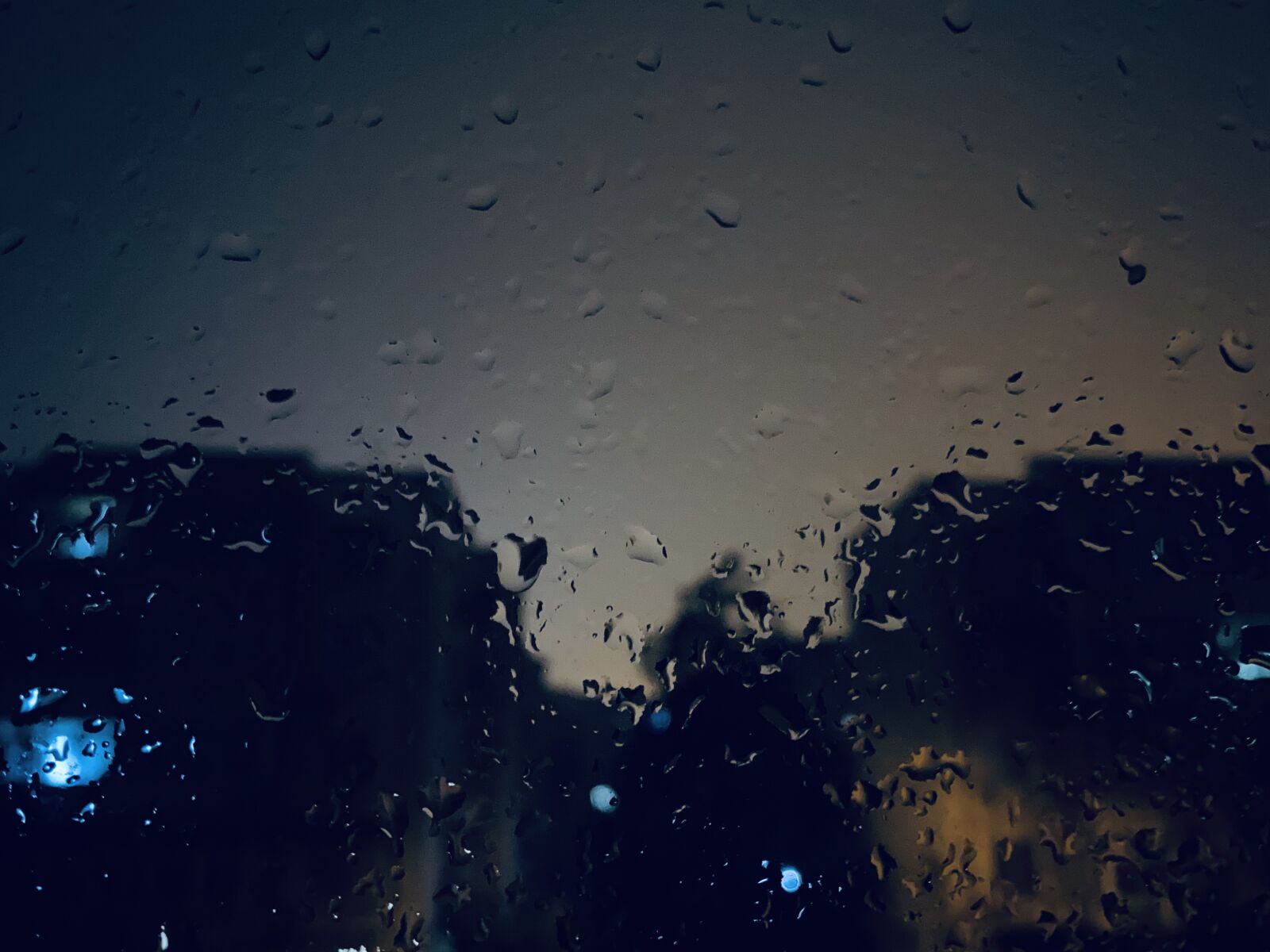 Apple iPhone 11 Pro Max sample photo. Rain, window, night photography