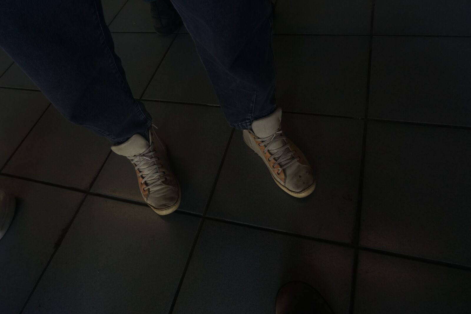 Sony a6000 sample photo. Shoes, dark, yellow shoes photography