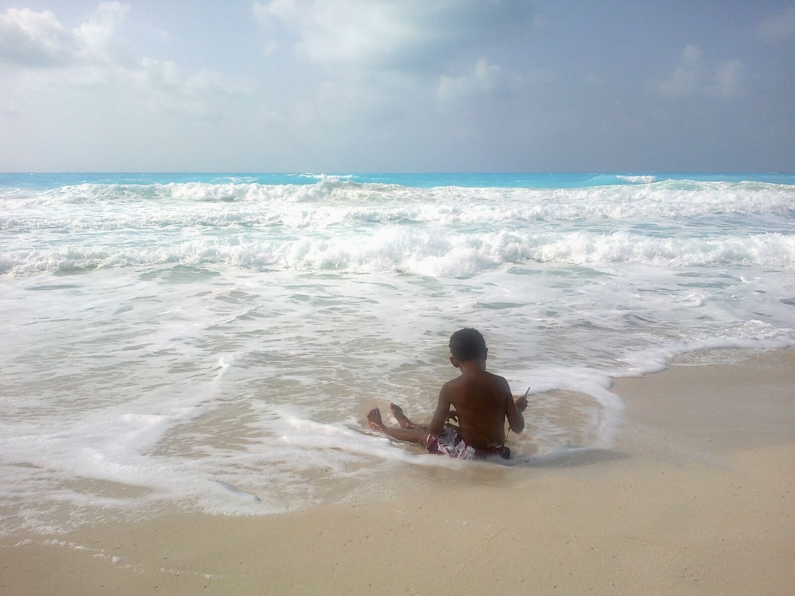 Nokia E5-00 sample photo. Sea, waves, boy photography