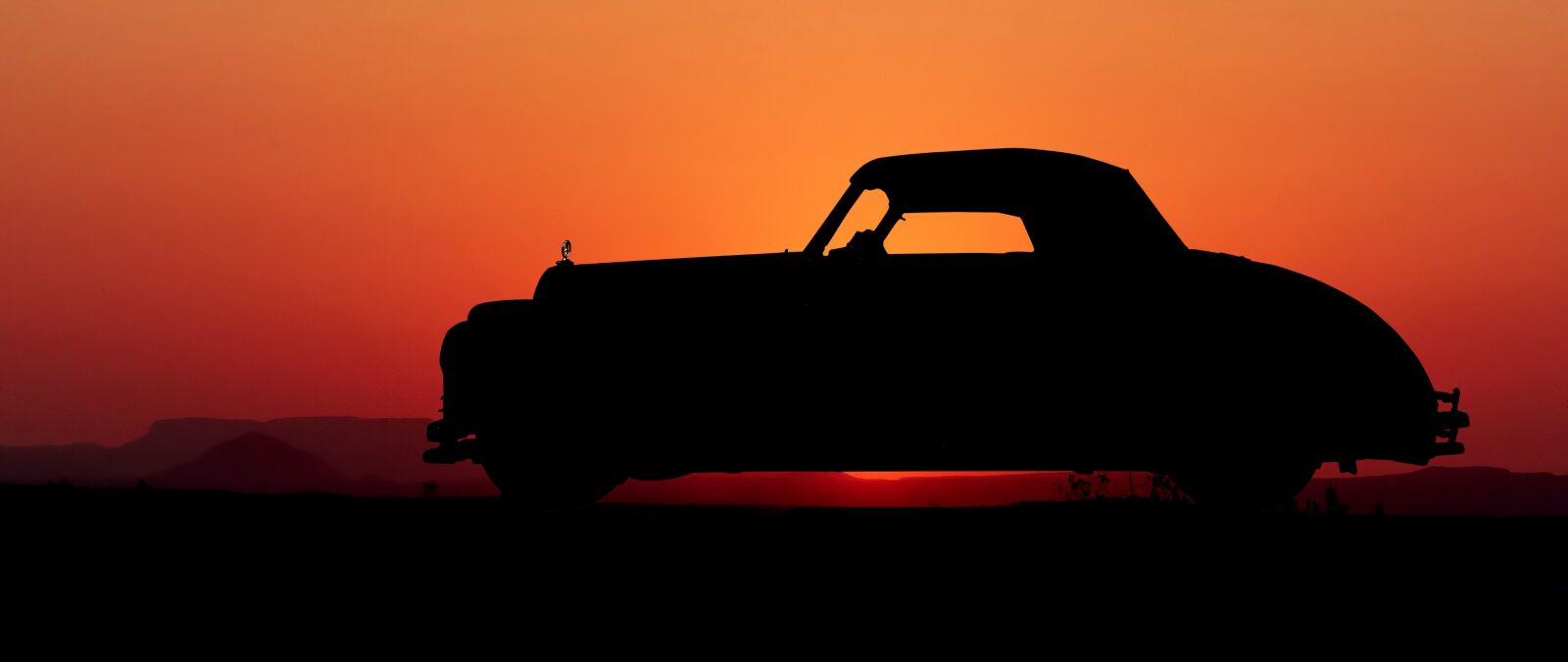 Panasonic Lumix DMC-FZ200 sample photo. Sunset, car, former photography