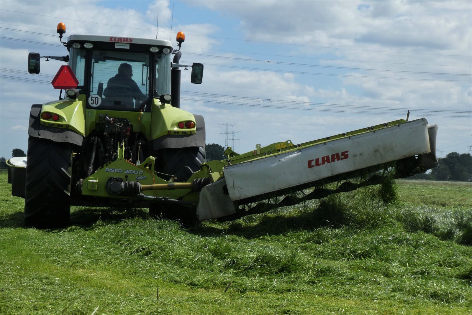 Panasonic Lumix DC-ZS70 (Lumix DC-TZ90) sample photo. Tractor, agricultural machinery, grassland photography