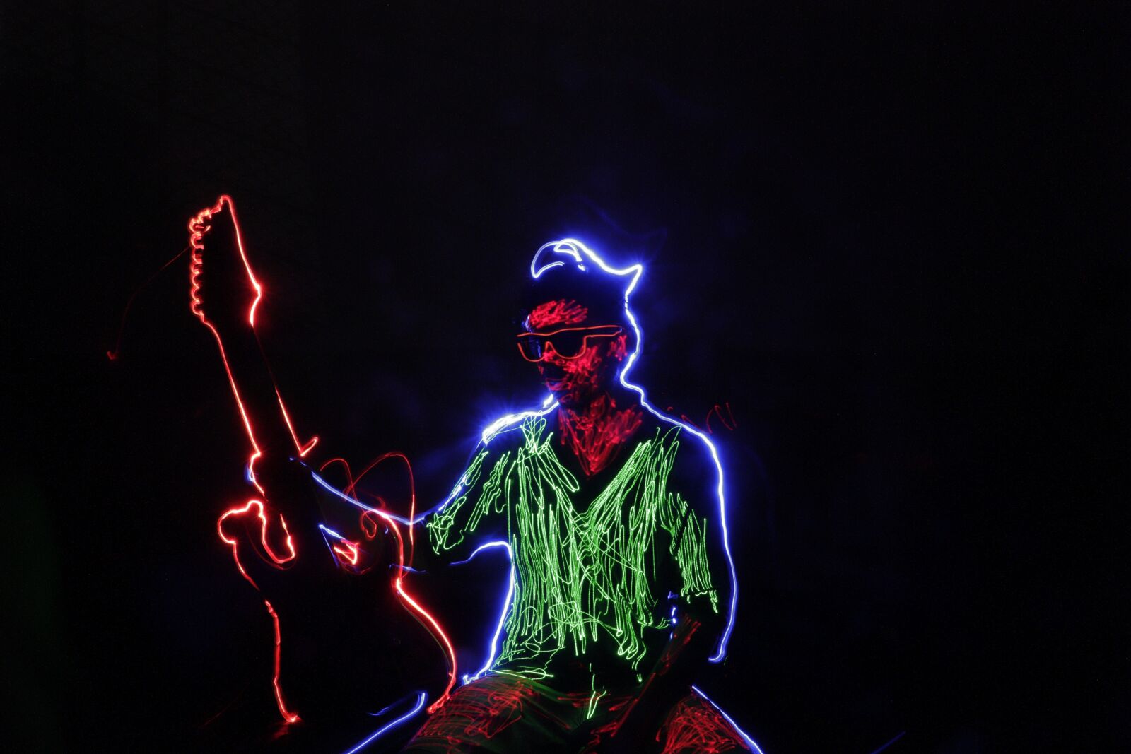 Canon EF-S 18-135mm F3.5-5.6 IS USM sample photo. Stop motion, lightpainting, guitar photography