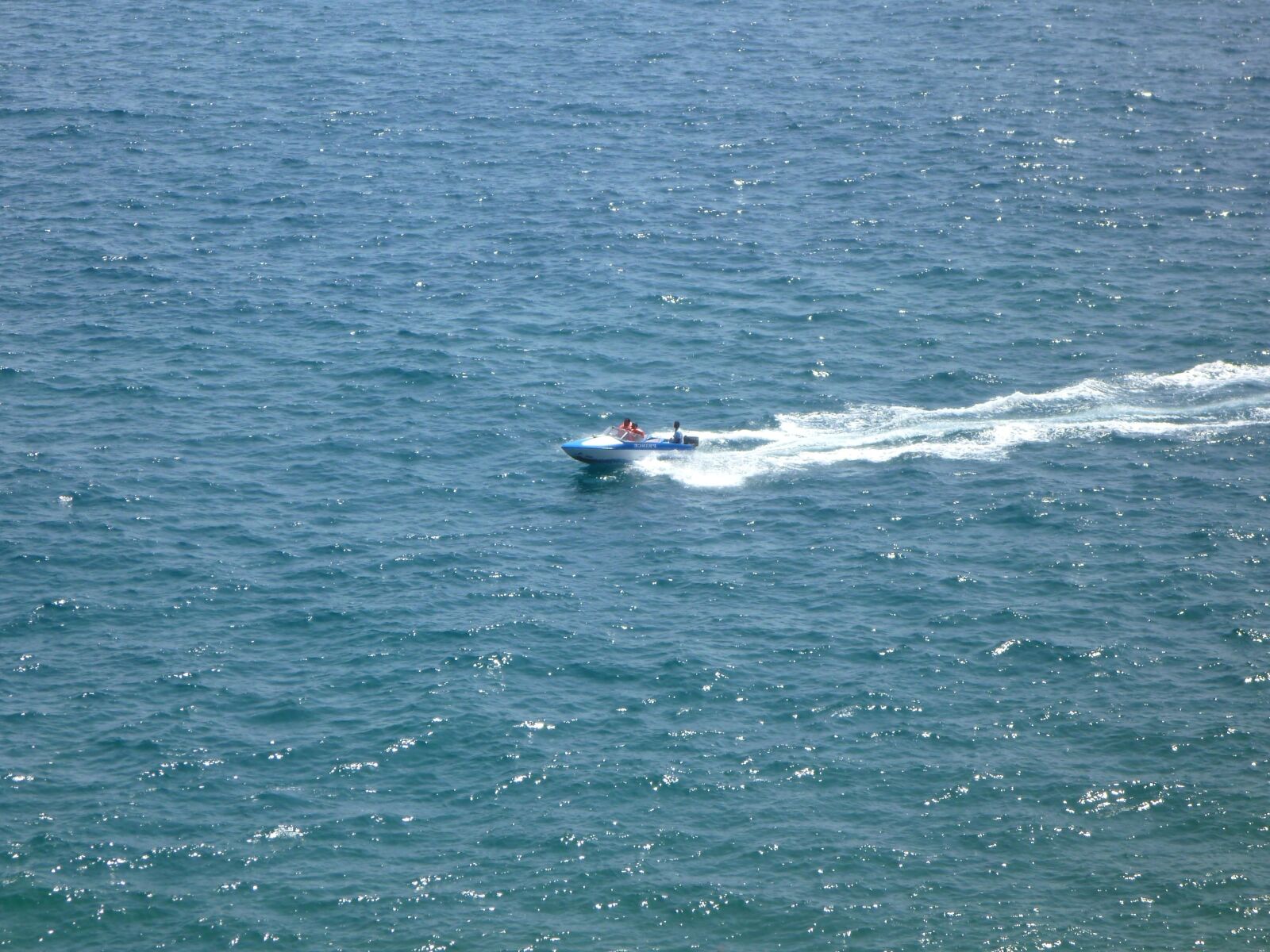 Panasonic DMC-TS2 sample photo. Speed boat, blue, water photography