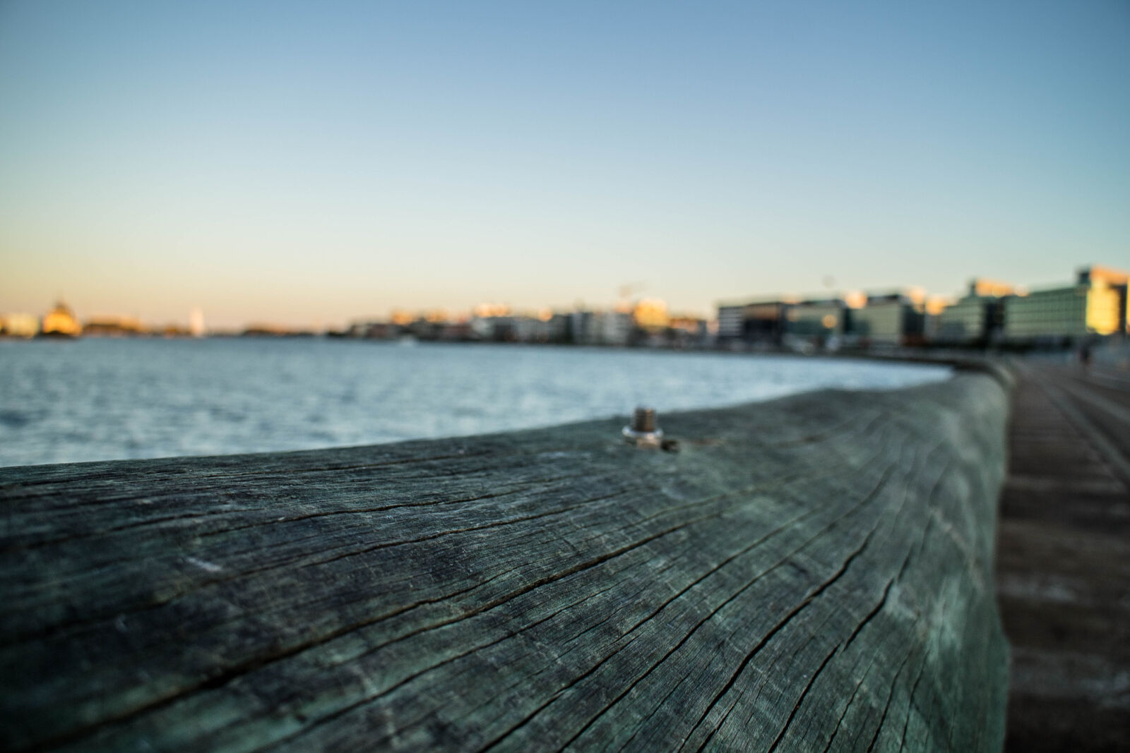 Canon EOS M2 sample photo. Bark, blur, buildings, city photography