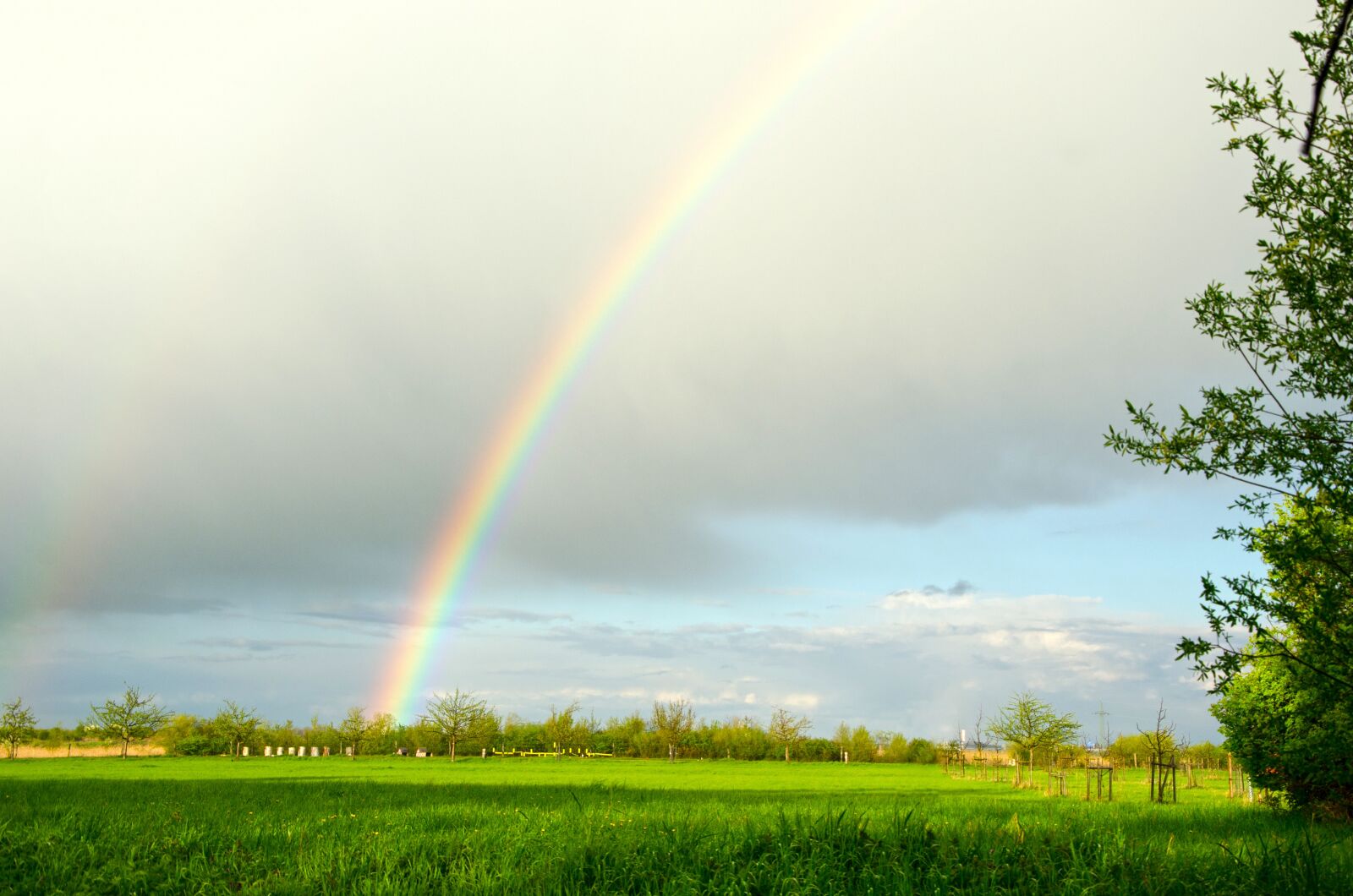 Nikon D5100 sample photo. Rainbow, clouds, sun photography
