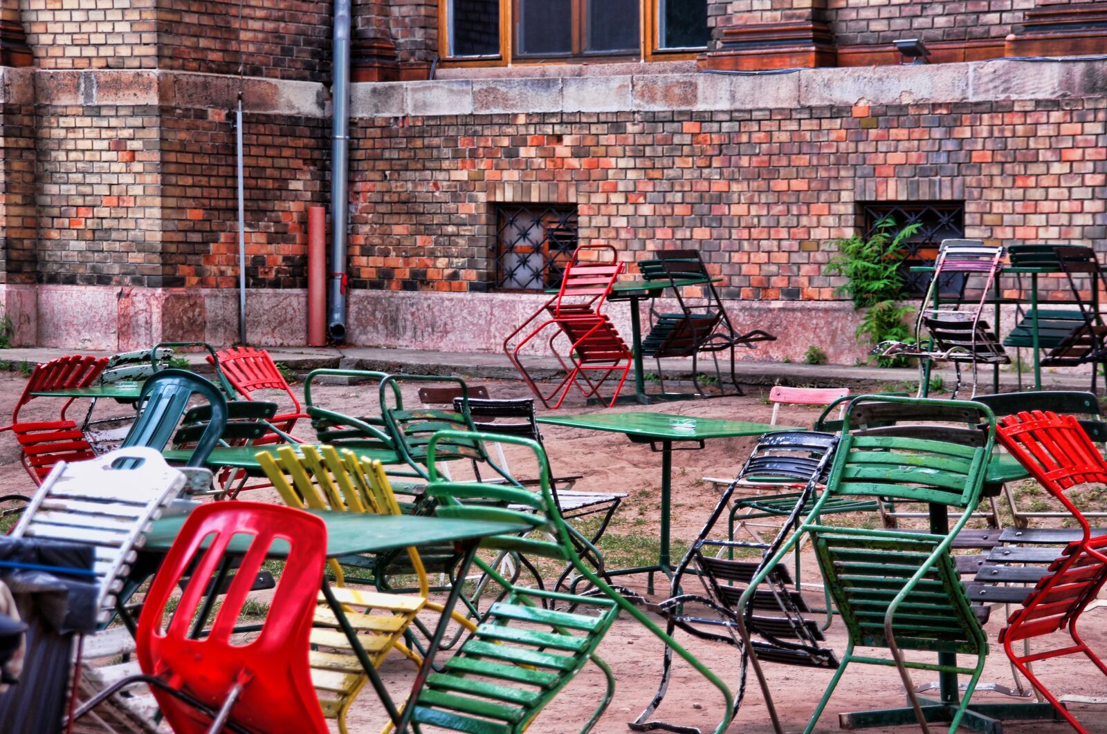 Sony Alpha DSLR-A580 sample photo. Beer garden, chairs, colorful photography