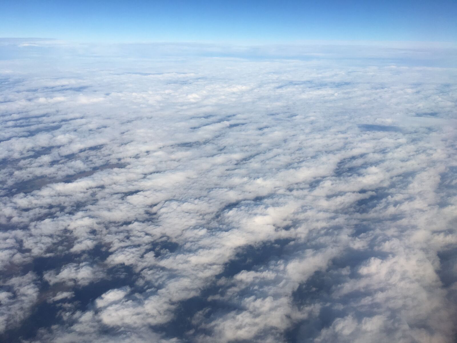 iPhone 6s back camera 4.15mm f/2.2 sample photo. Sky, clouds, airplane photography