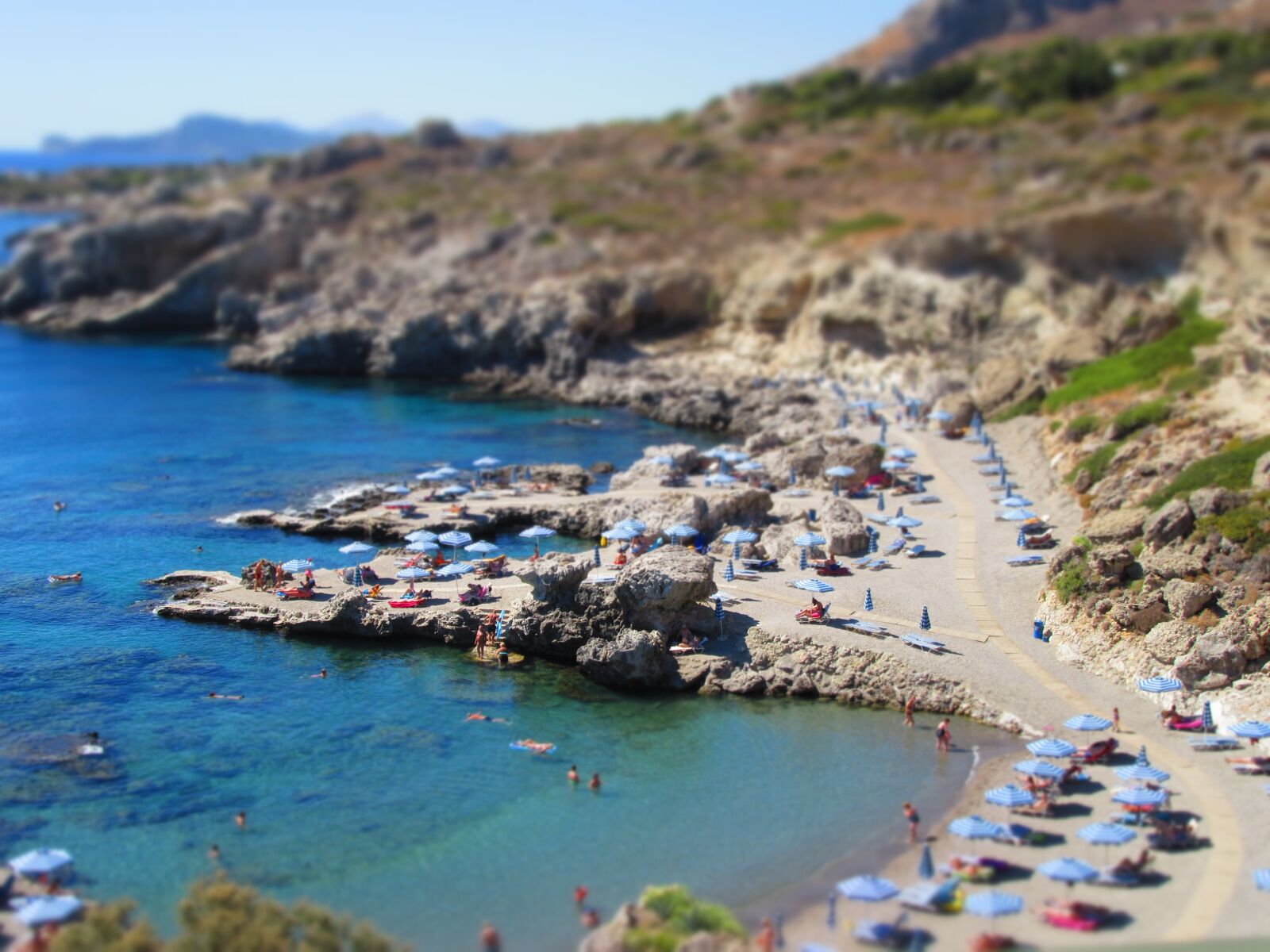 Canon PowerShot SX610 HS sample photo. Greece, beach, stone beach photography