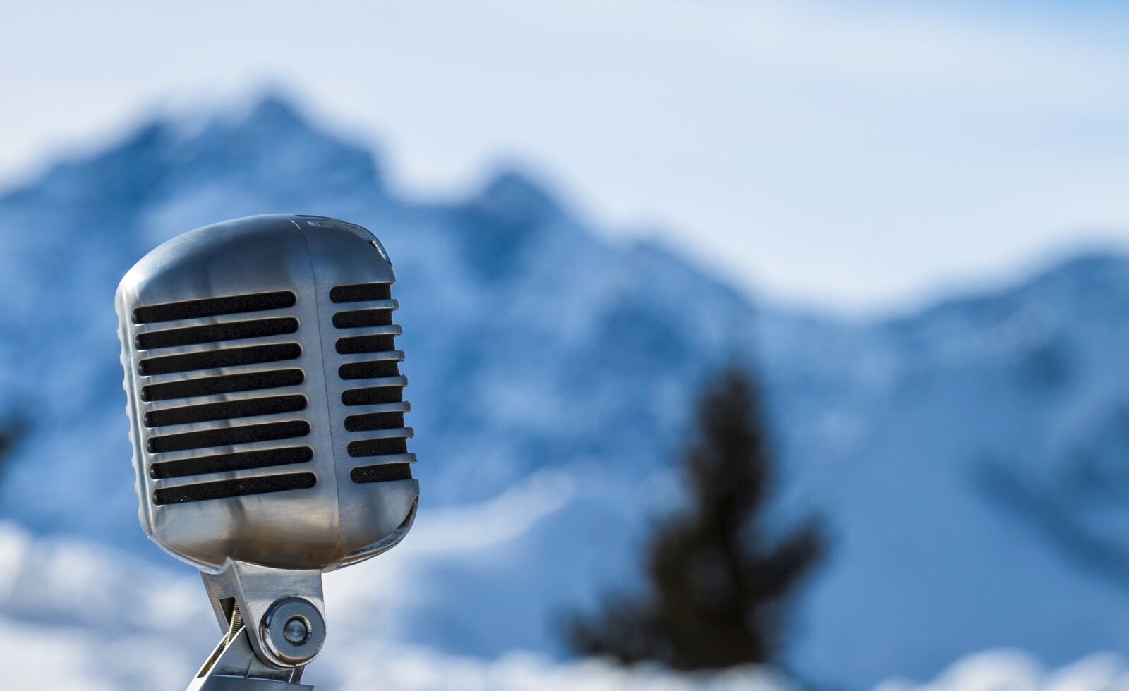 Sony E PZ 18-200mm F3.5-6.3 OSS sample photo. Microphone, mountains, snow photography