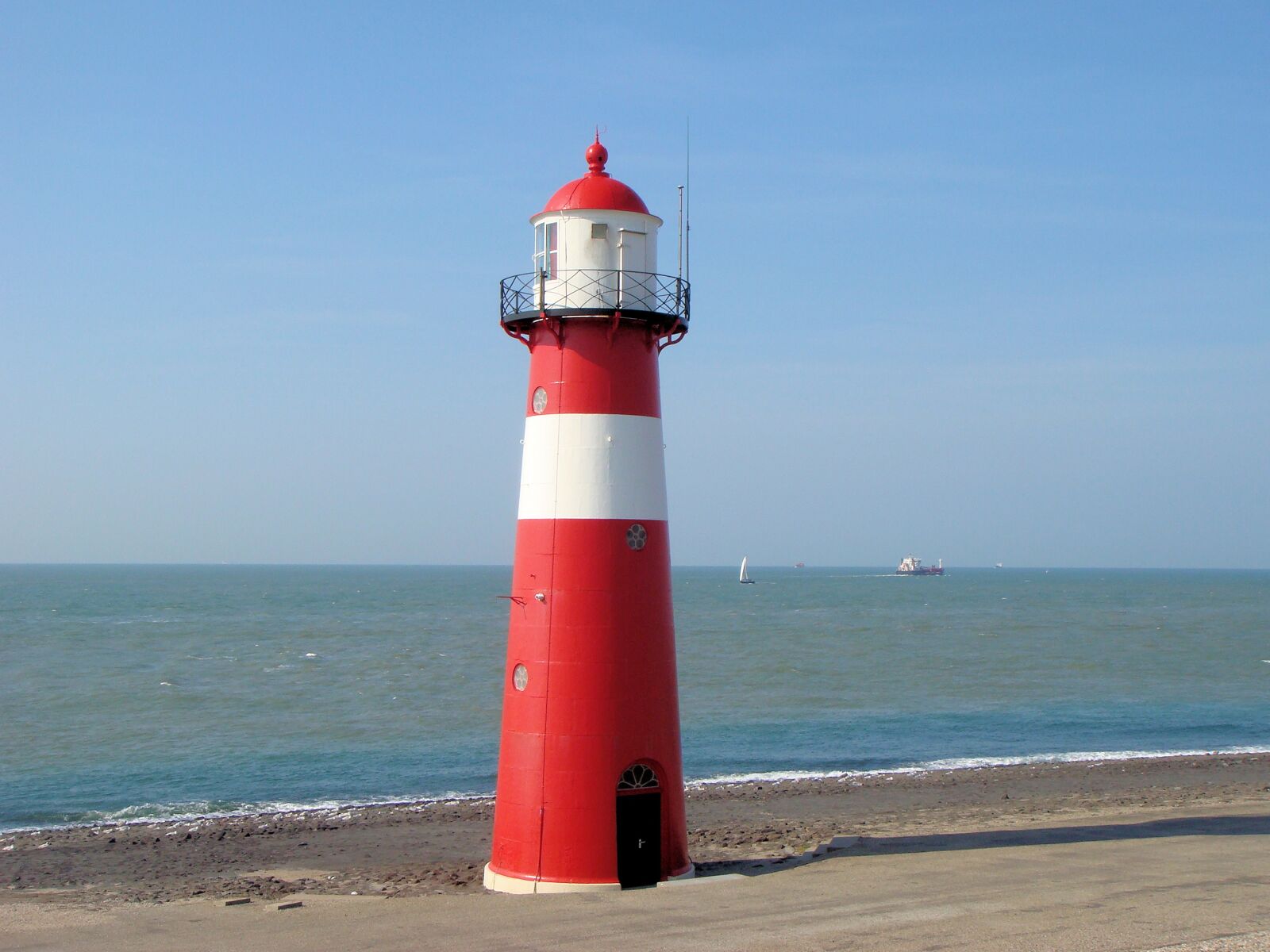 Sony DSC-T100 sample photo. Lighthouse, netherlands, coast photography