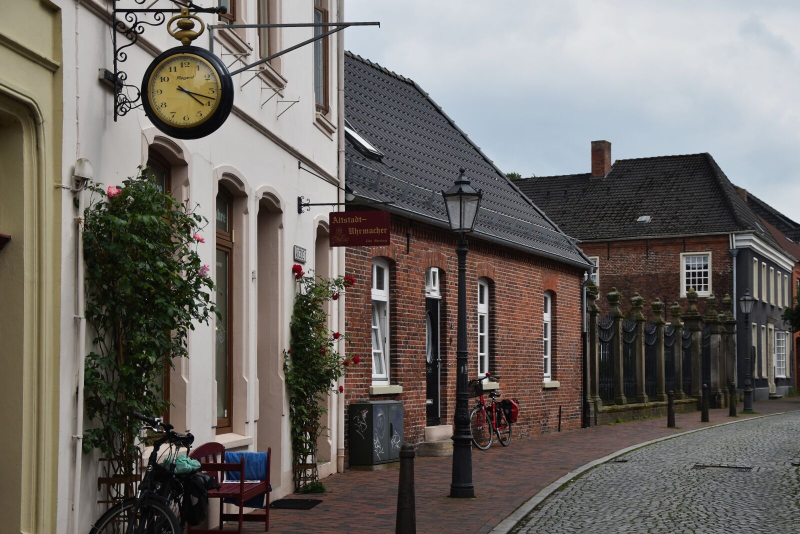 Nikon D5600 sample photo. Road, bike, clock photography