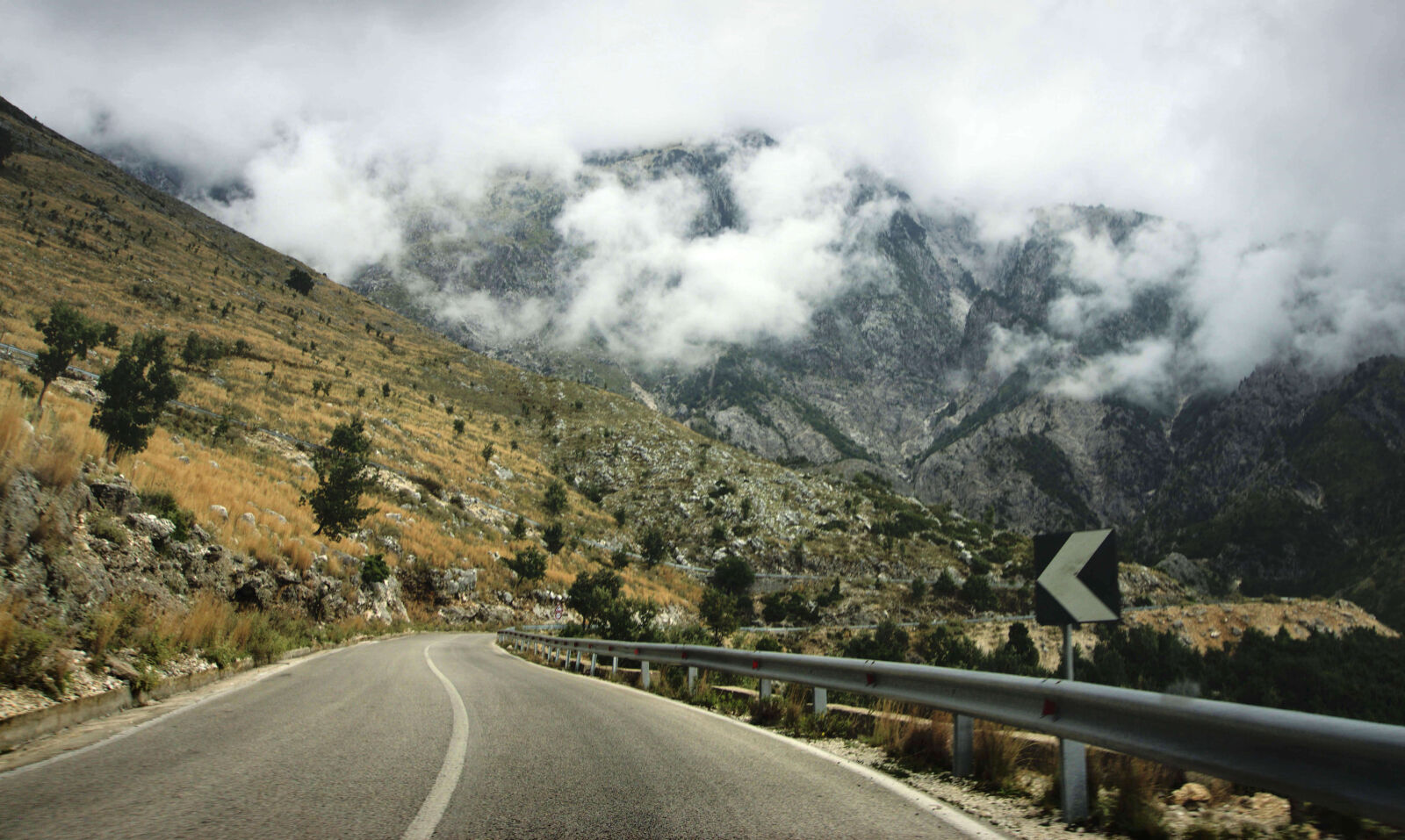 Sony a6000 sample photo. Concrete, road, near, cliff photography