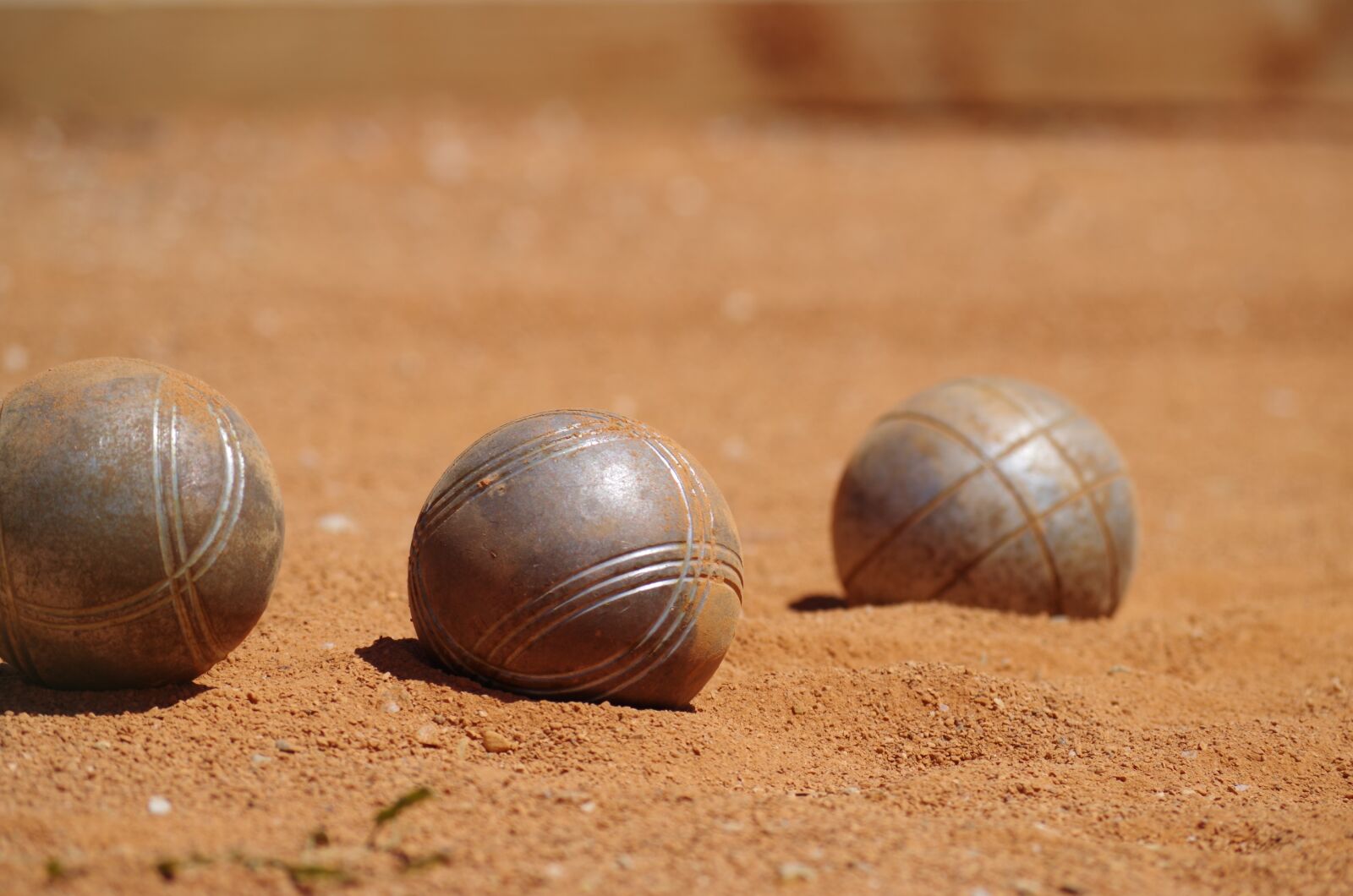 Pentax K-500 sample photo. Petanque, sand, game photography