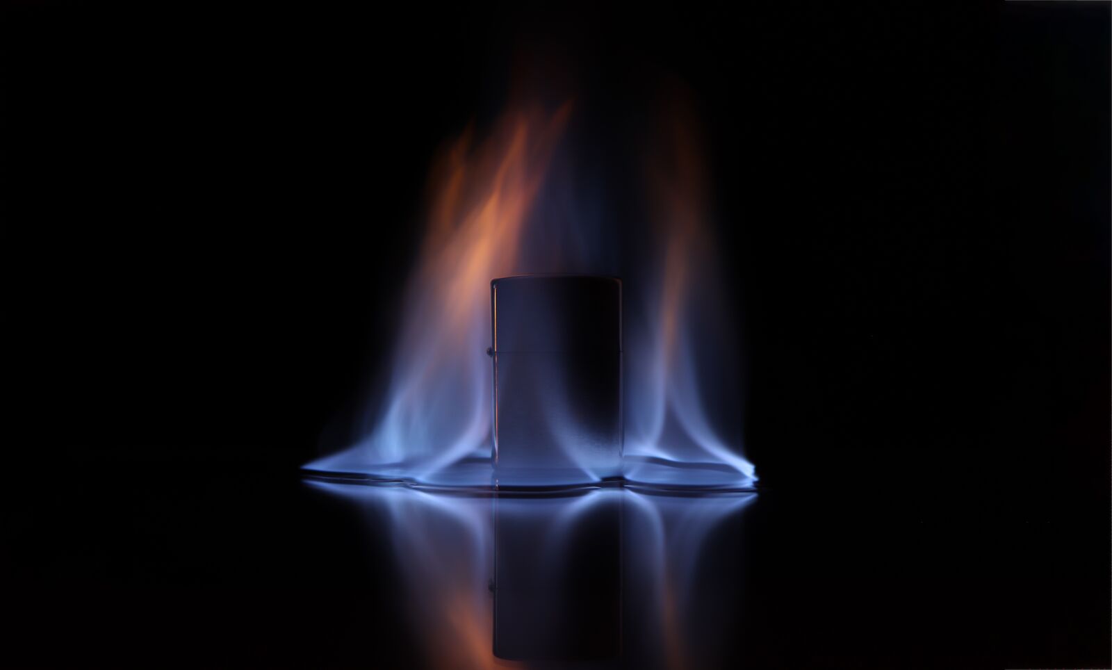 Canon EF-S 18-135mm F3.5-5.6 IS USM sample photo. Fire, zippo, lighting photography