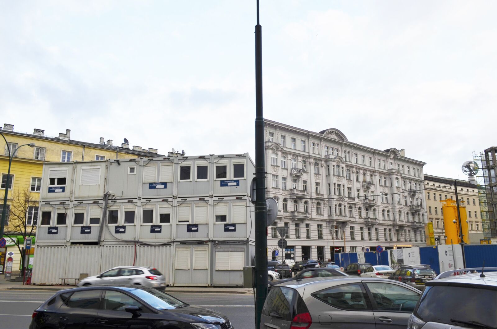 Nikon D5100 sample photo. Cars, city, containers, illusion photography