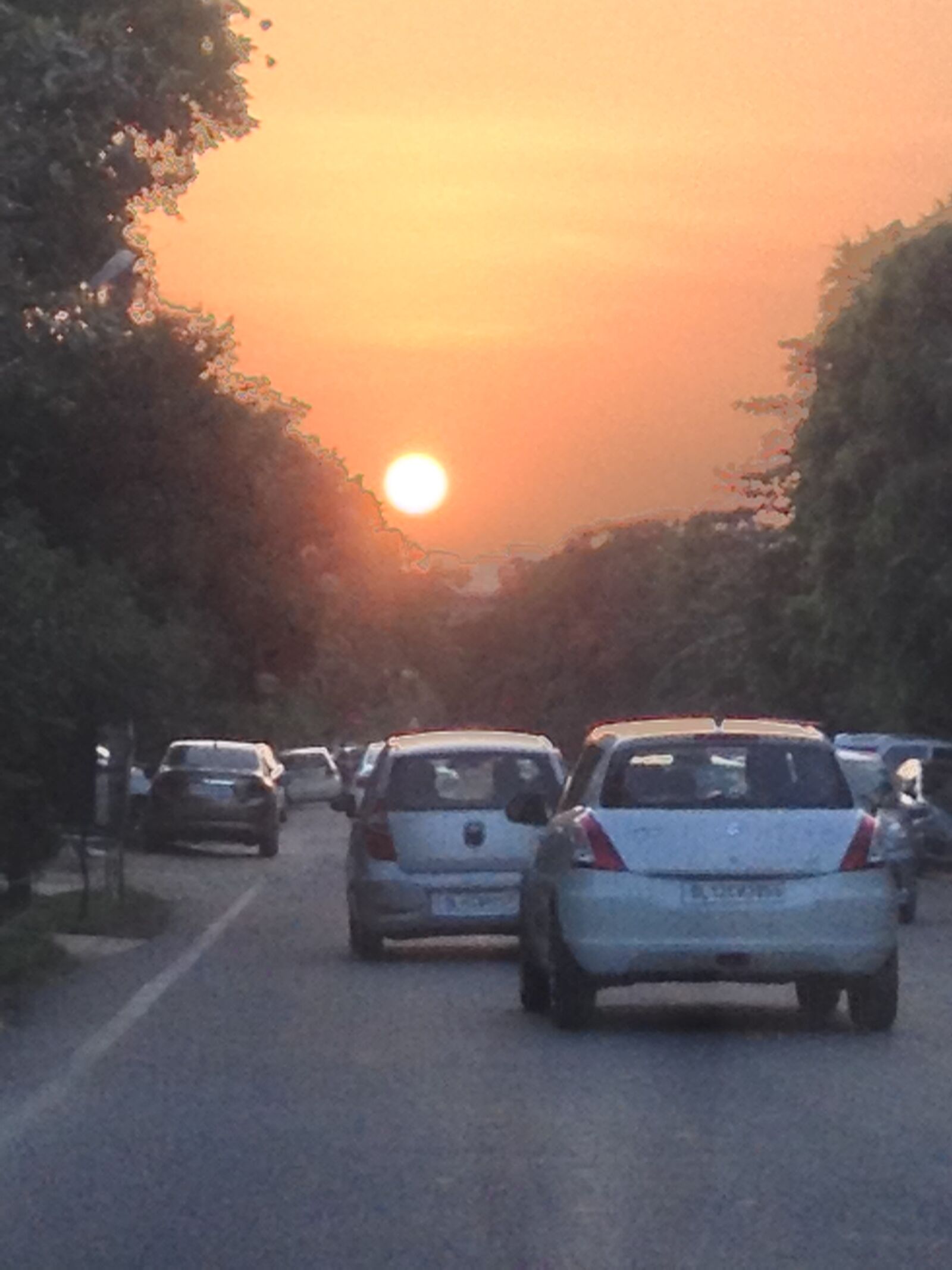 iPhone 4S back camera 4.28mm f/2.4 sample photo. Sunset, busy road, gurgaon photography