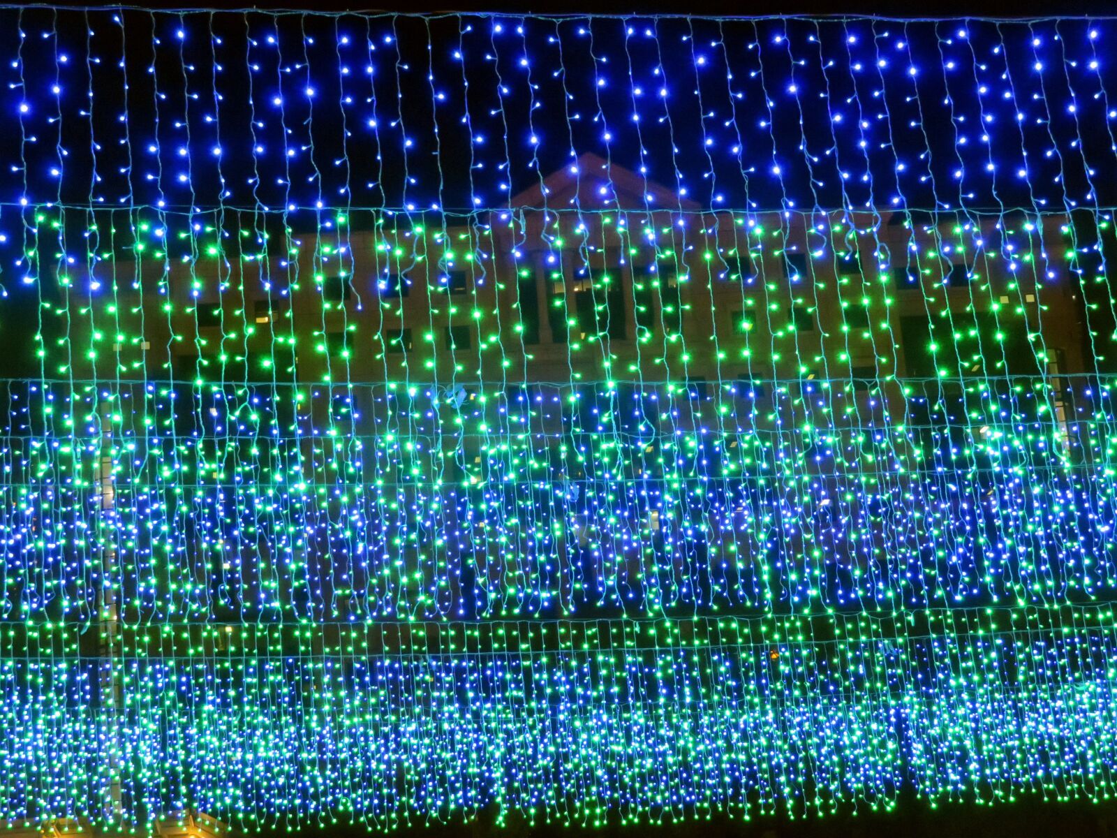 Canon PowerShot SX730 HS sample photo. Blue lights, horizontal, green photography