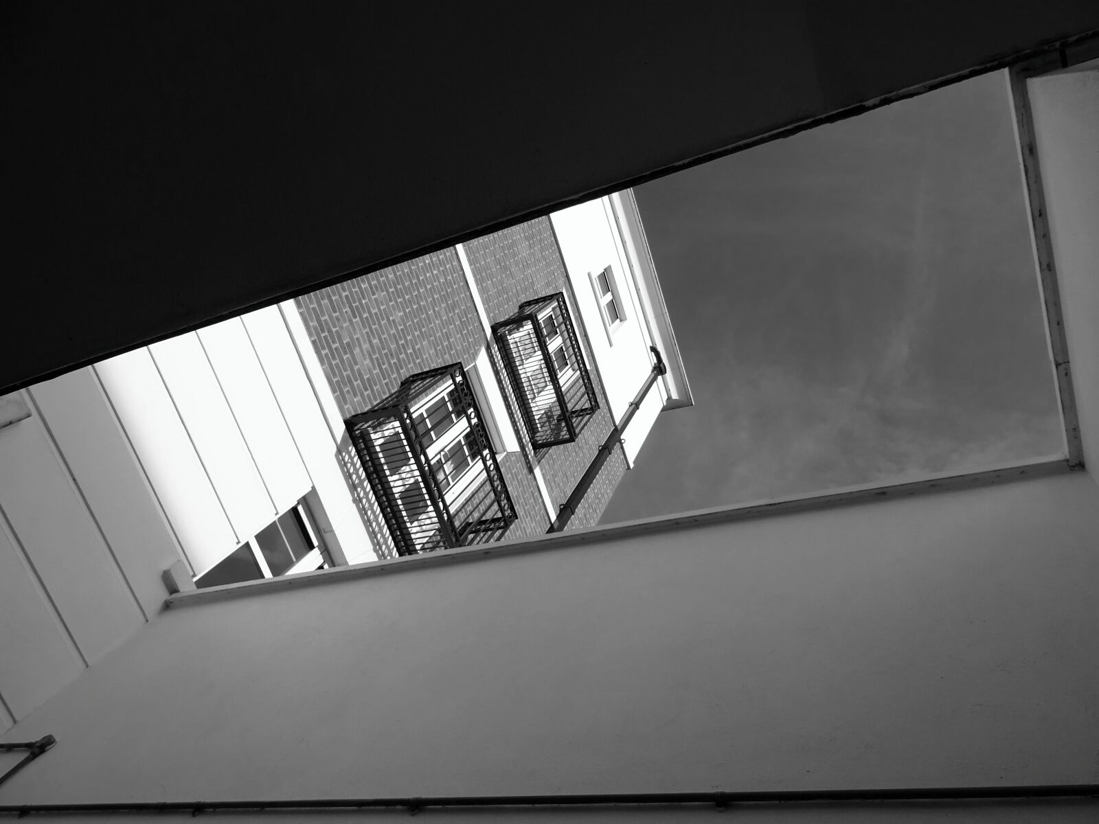 Sony DSC-HX60 sample photo. Balconies, black, and, white photography