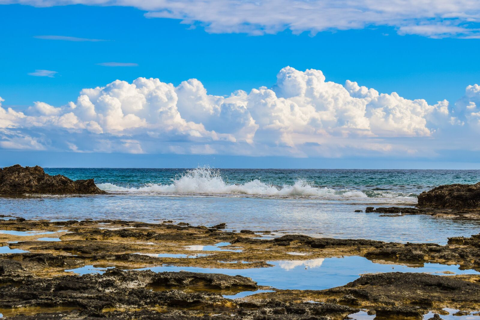 Nikon D3300 sample photo. Rocky coast, wave, sky photography
