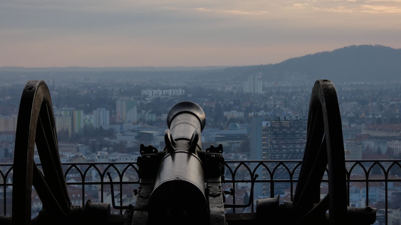 Panasonic DC-FZ83 sample photo. Gun, city, view photography