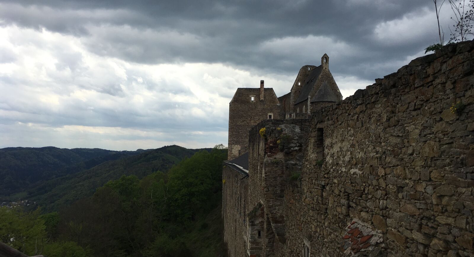 Apple iPhone 6s sample photo. Castle, clouds, dark, green photography