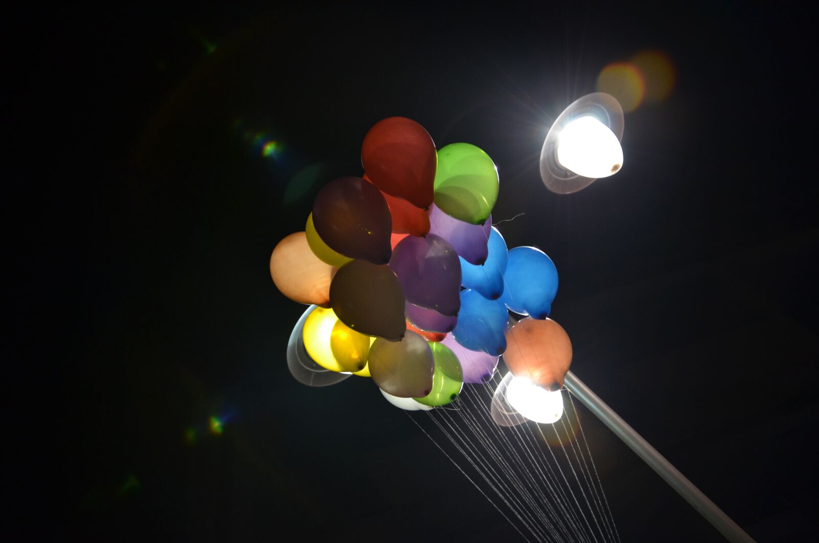 Nikon D7000 sample photo. Balloons, street, night photography