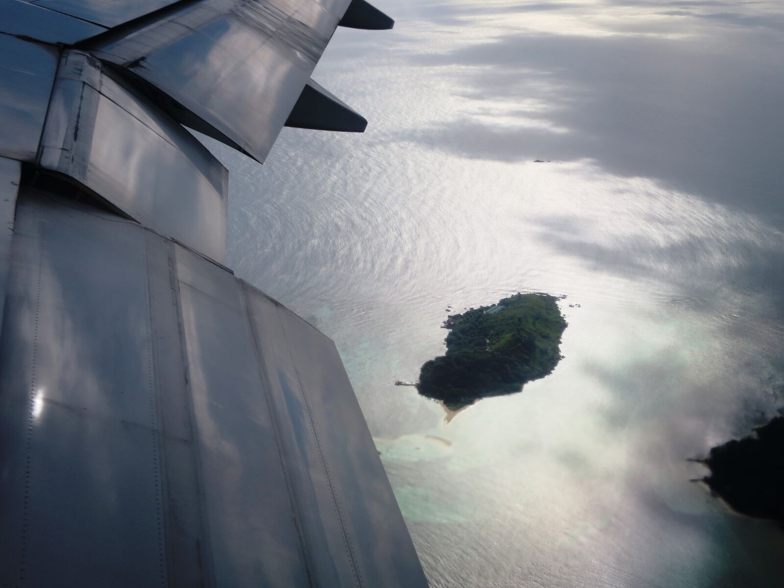 Canon PowerShot S120 sample photo. Aircraft, island, flying photography