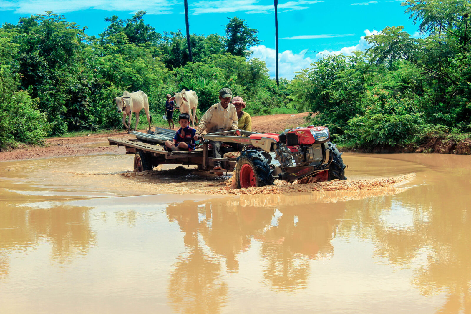 Canon EOS 1200D (EOS Rebel T5 / EOS Kiss X70 / EOS Hi) sample photo. Cambodia, rural, kid, farmer photography