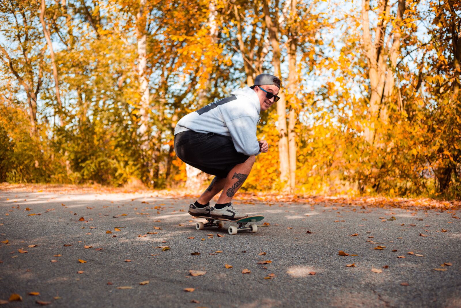 Canon EF 50mm F1.8 II sample photo. Skateboard, man, autumn photography
