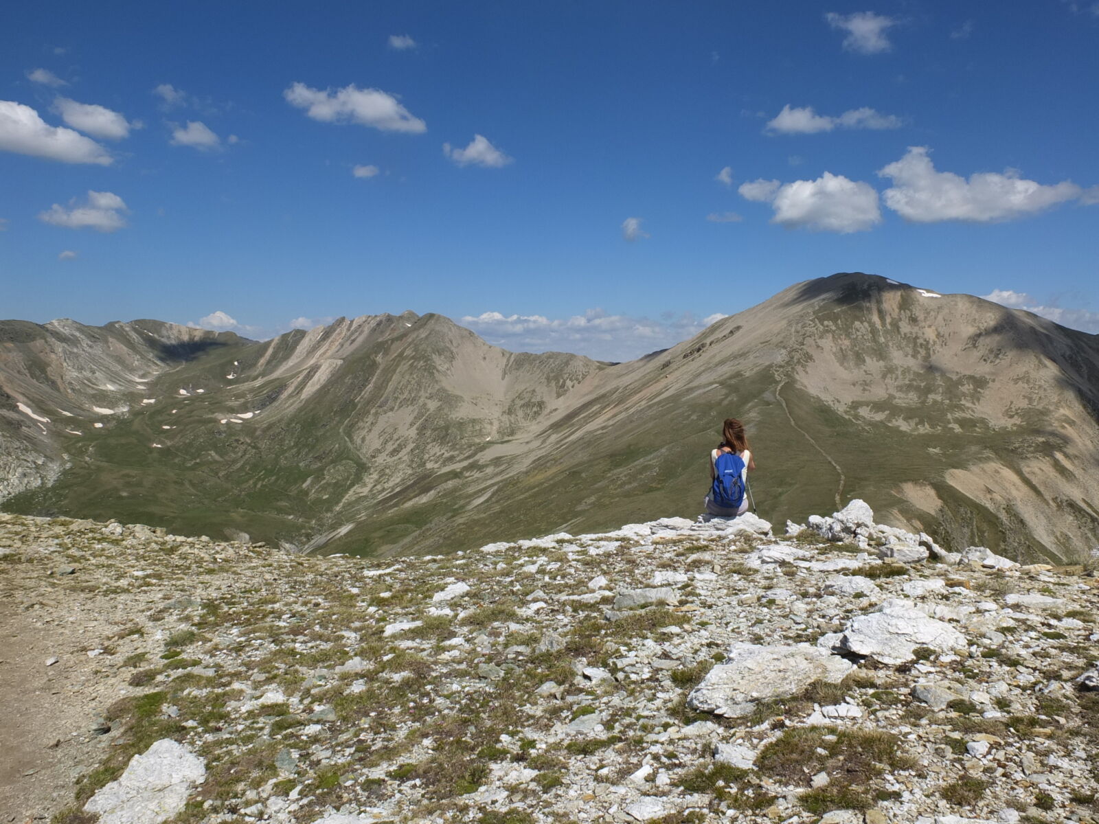 Fujifilm X10 sample photo. Woman, standing, on, mountain photography