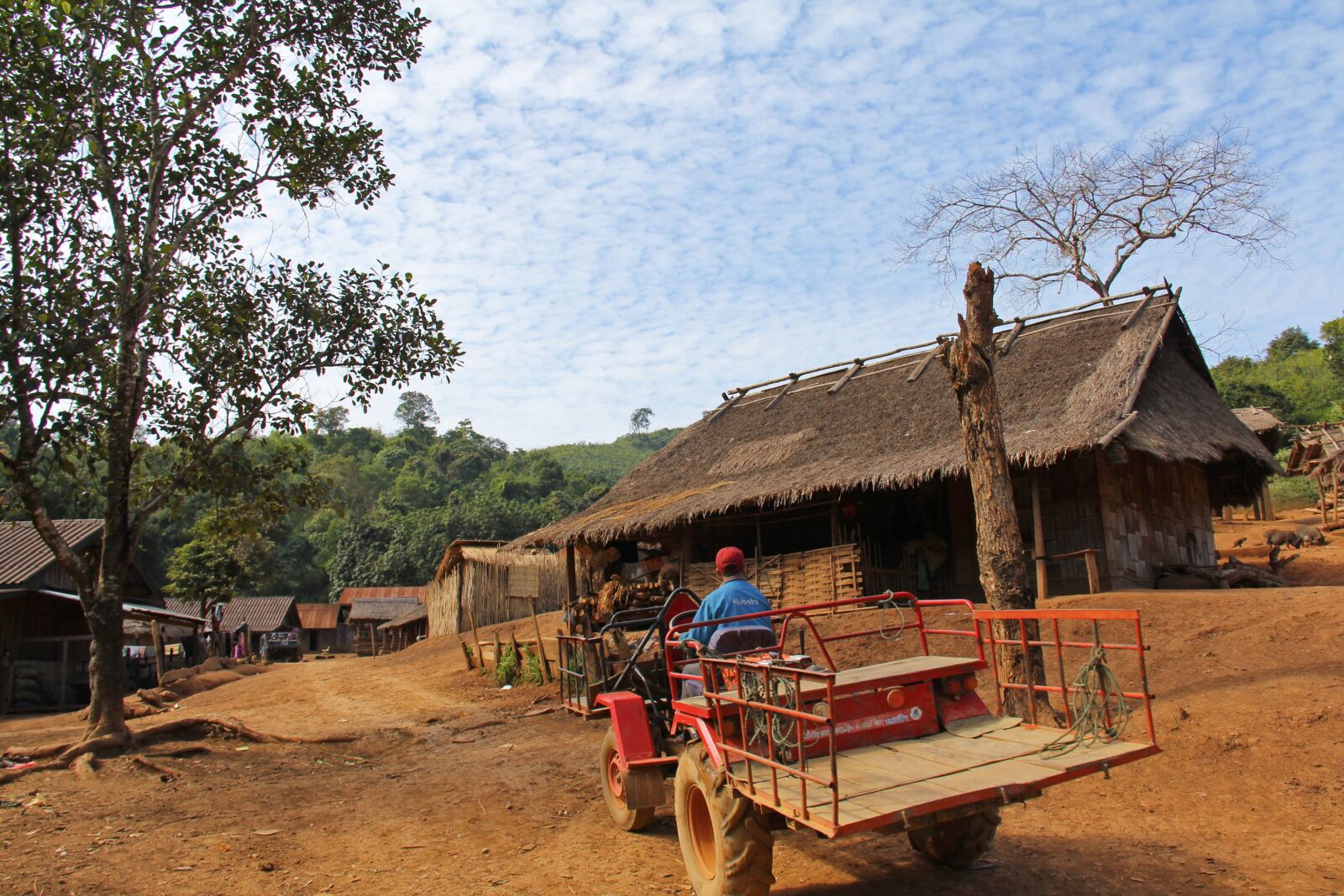 Canon EF-S 18-200mm F3.5-5.6 IS sample photo. Village, mountain, delivery photography