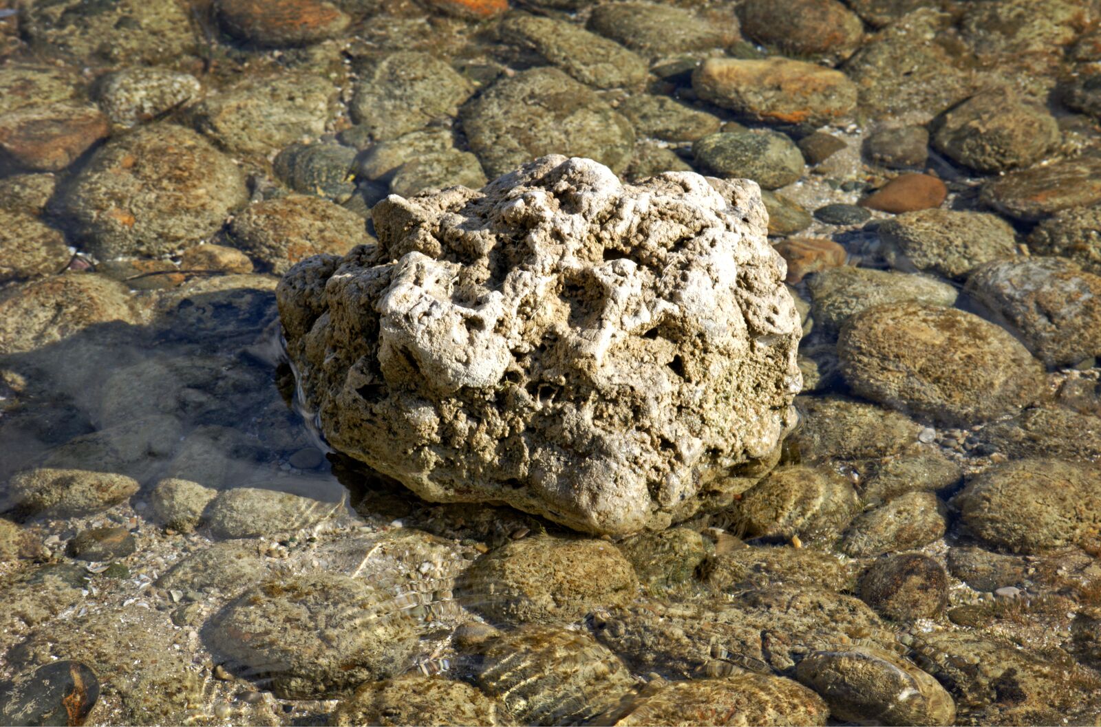 55.0-200.0mm f/4.0-f/5.6 sample photo. Water, stones, boulder photography