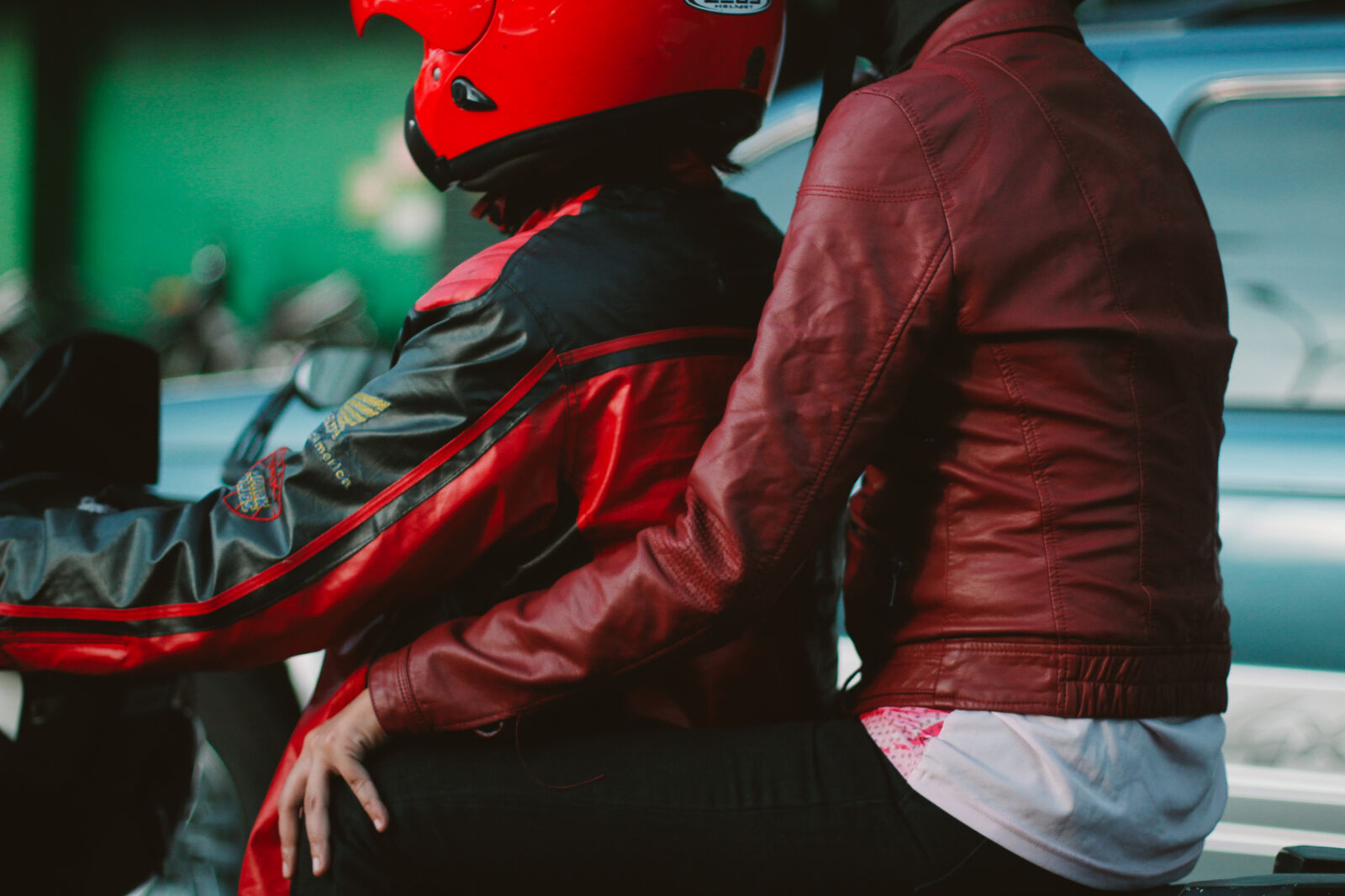 Canon EOS 600D (Rebel EOS T3i / EOS Kiss X5) + Canon EF 50mm F1.4 USM sample photo. Couple, motorcycle, red, transportation photography