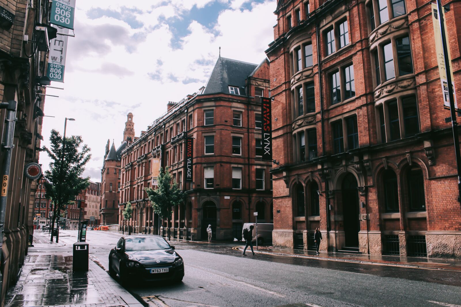 Canon EOS 700D (EOS Rebel T5i / EOS Kiss X7i) sample photo. Raining, car, building photography