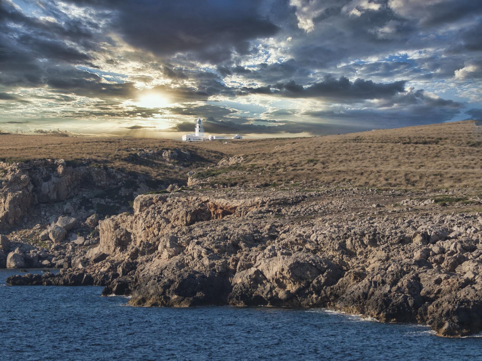 Olympus E-420 (EVOLT E-420) sample photo. Lighthouse, sunset, clouds photography