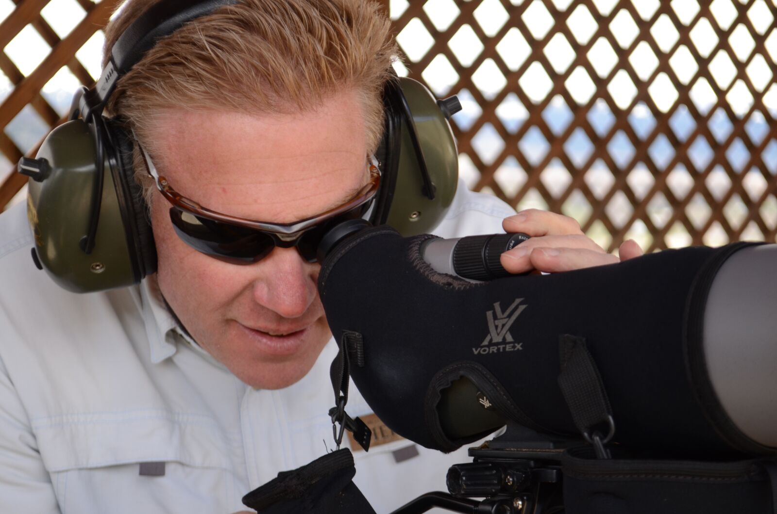 Nikon D7000 sample photo. Spotting scope, man looking photography