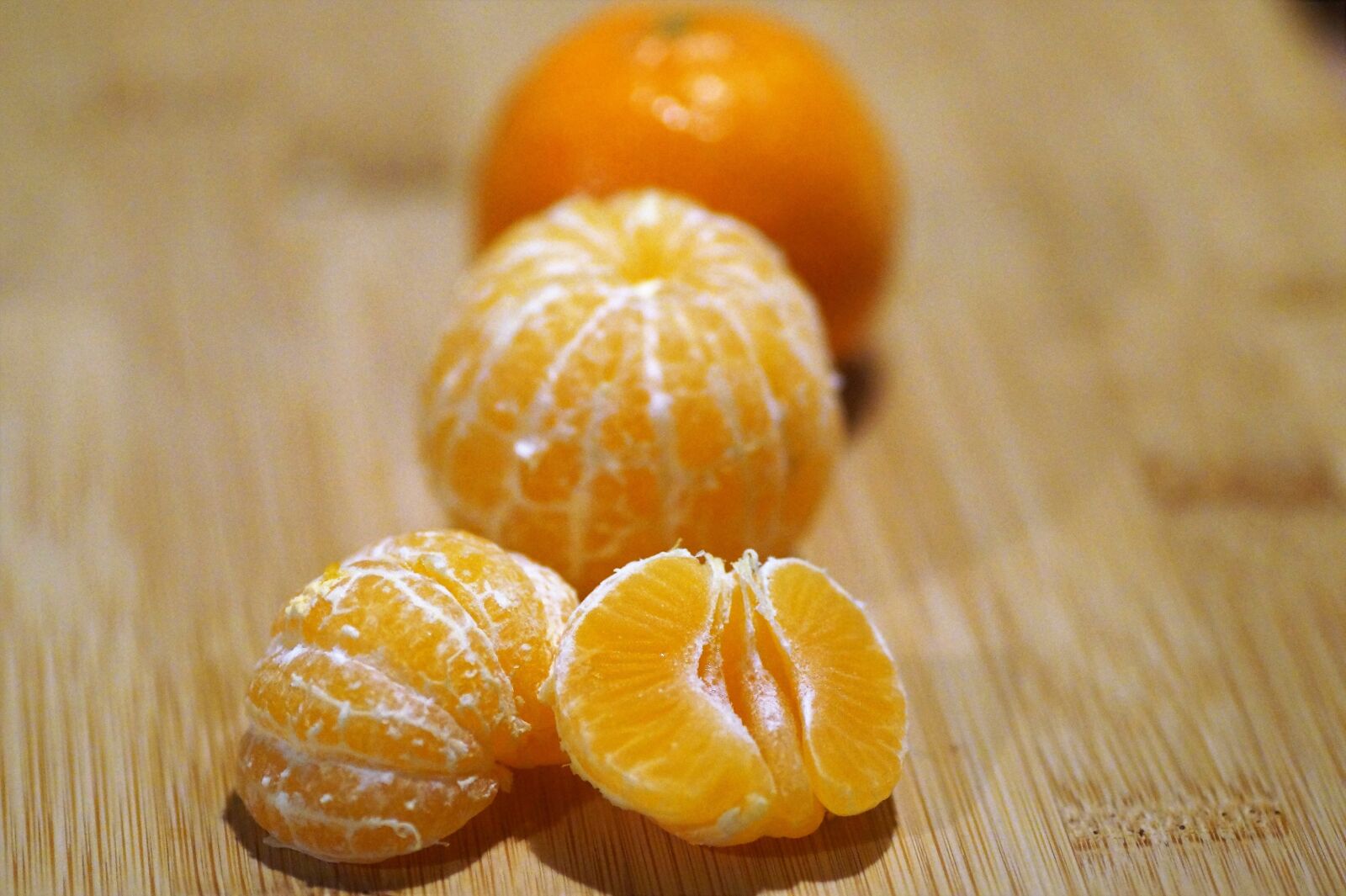 Sony SLT-A58 sample photo. Tangerines, peeled, orange photography
