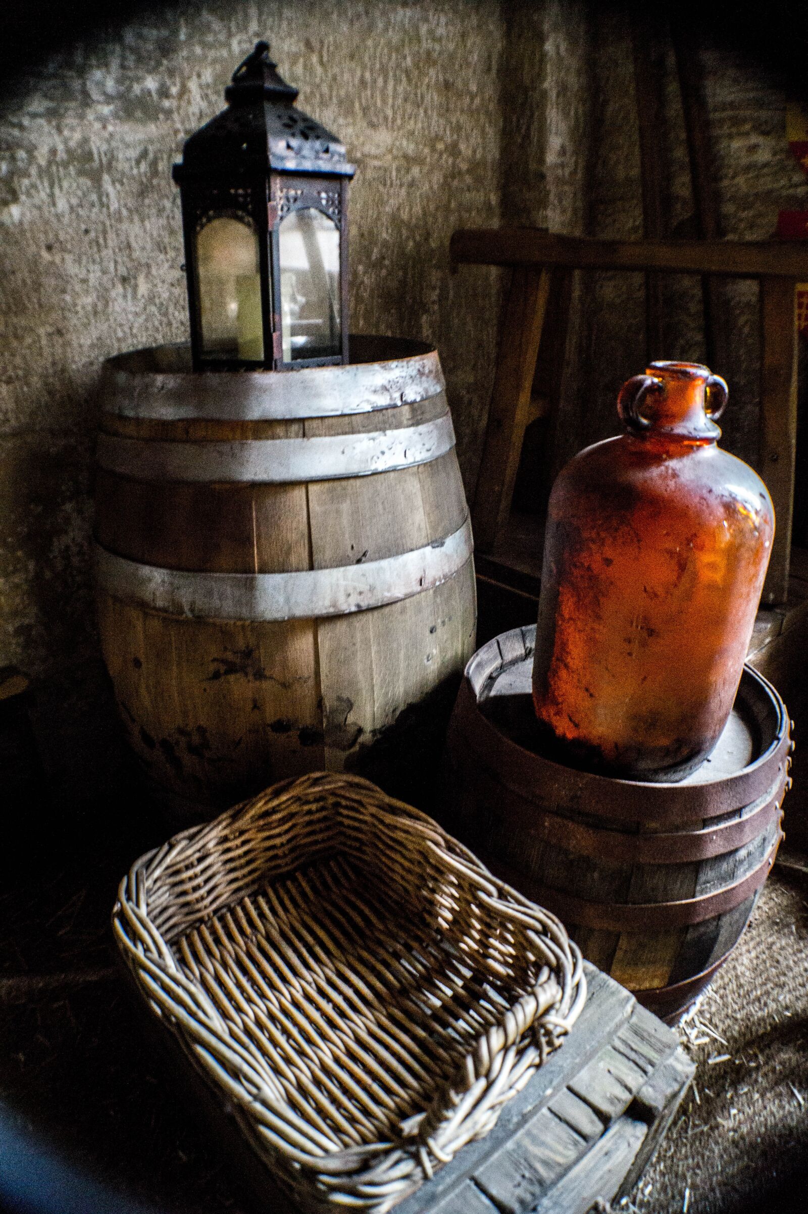 Sony DT 18-55mm F3.5-5.6 SAM II sample photo. Barrel, basket, glass bottle photography
