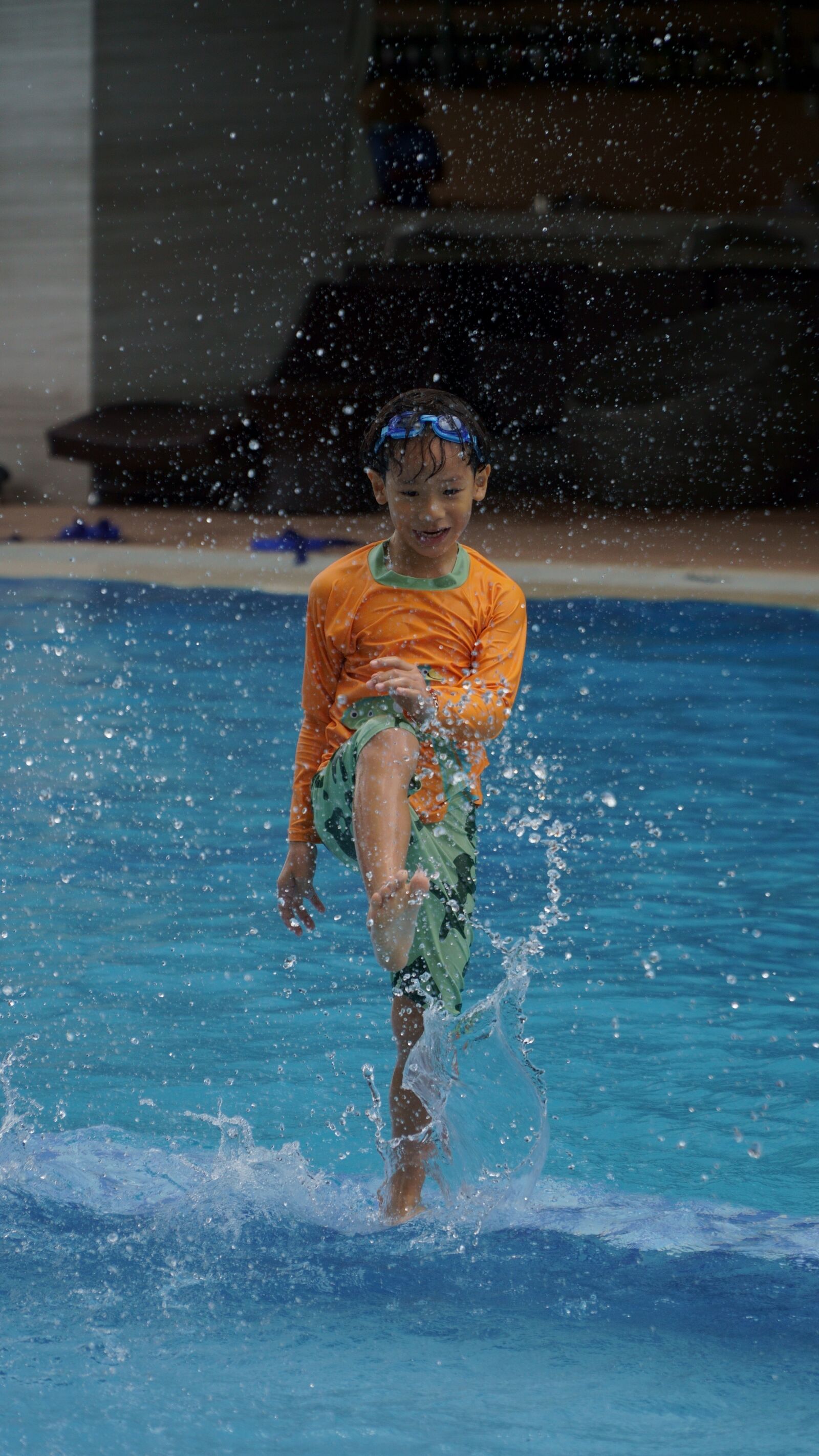 Sony E PZ 18-105mm F4 G OSS sample photo. Children with water, swimming photography