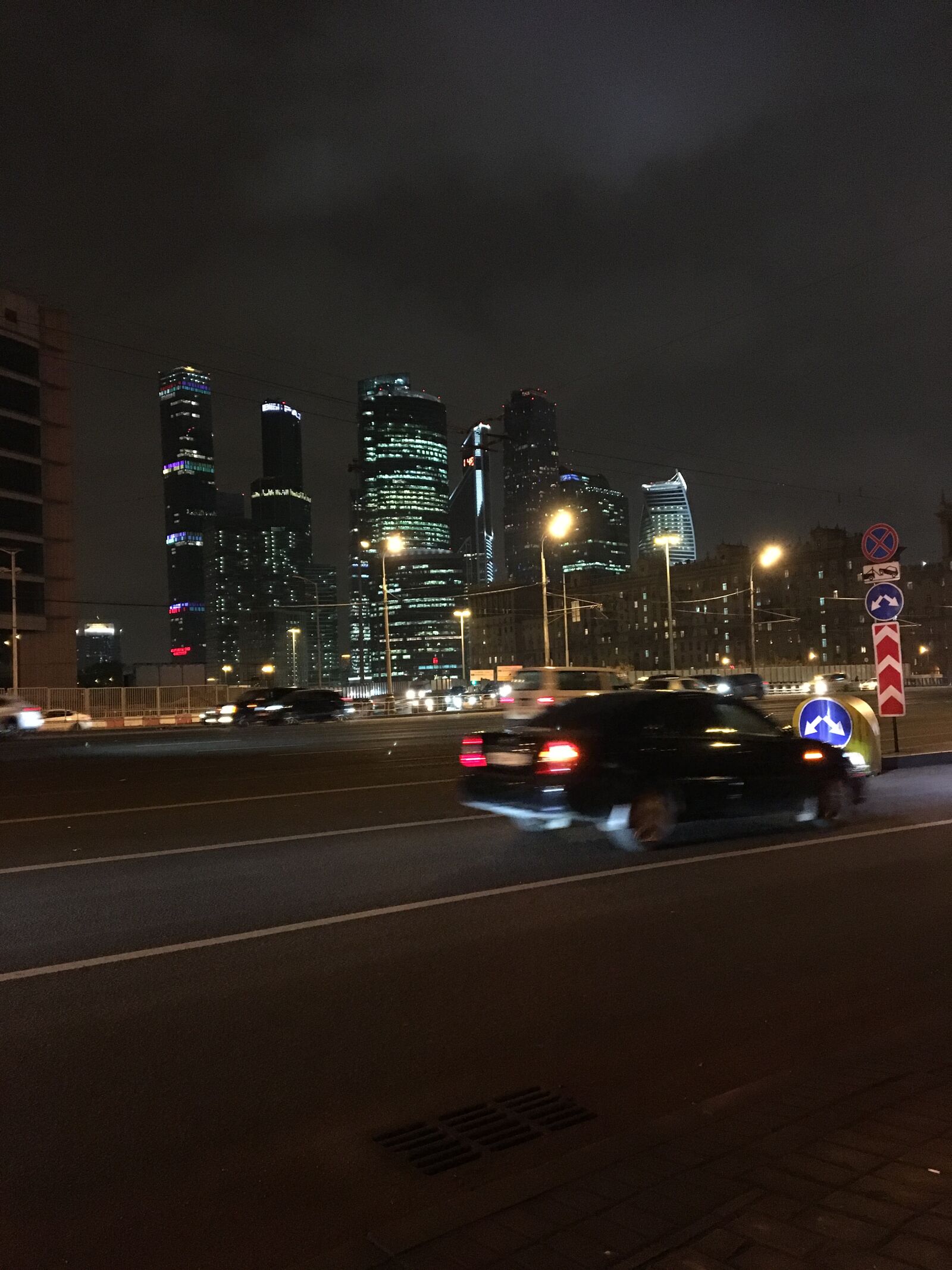 iPhone 6s back camera 4.15mm f/2.2 sample photo. Car, city, lights, night photography