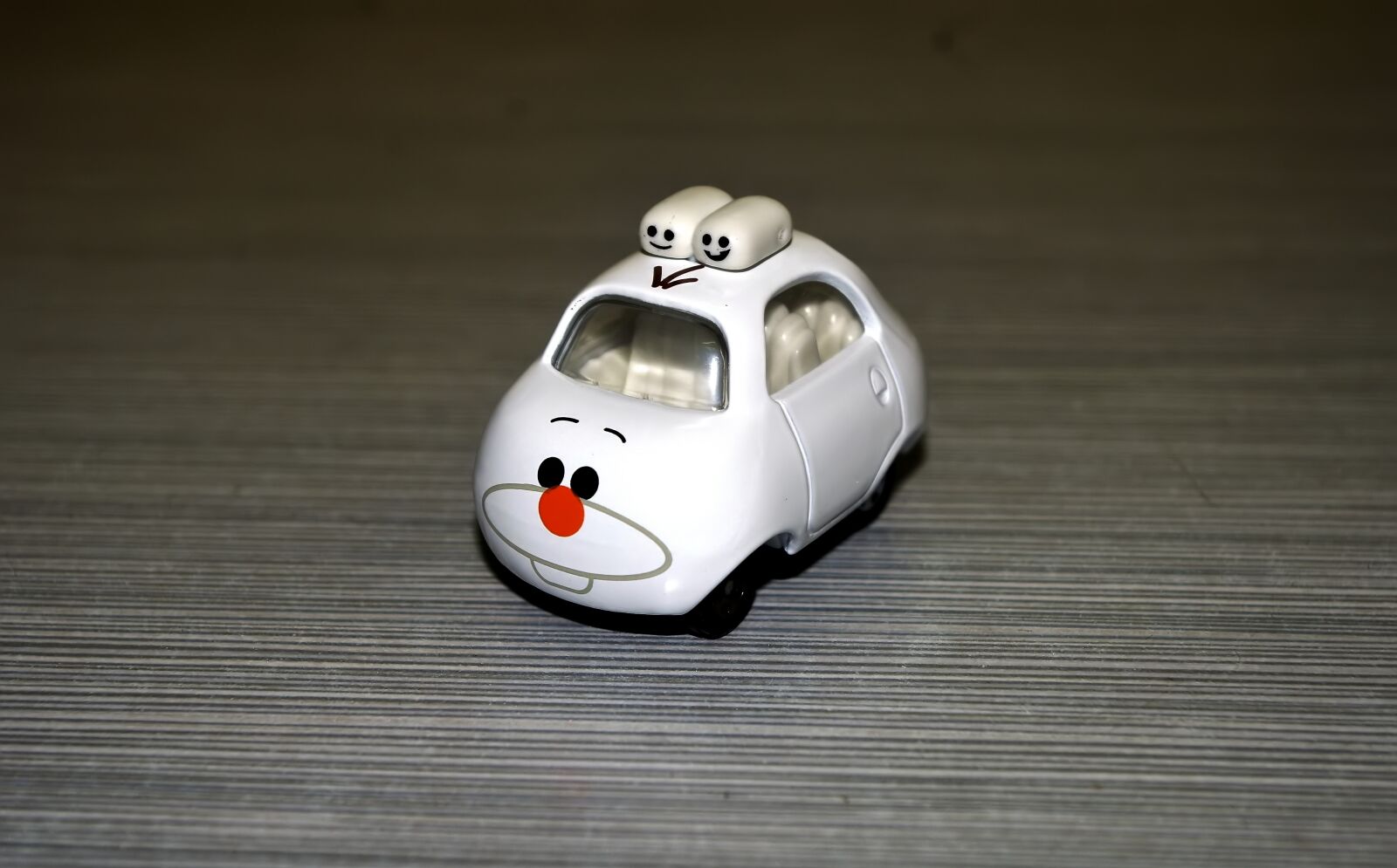 Pentax K-r sample photo. White bunny car, wild photography
