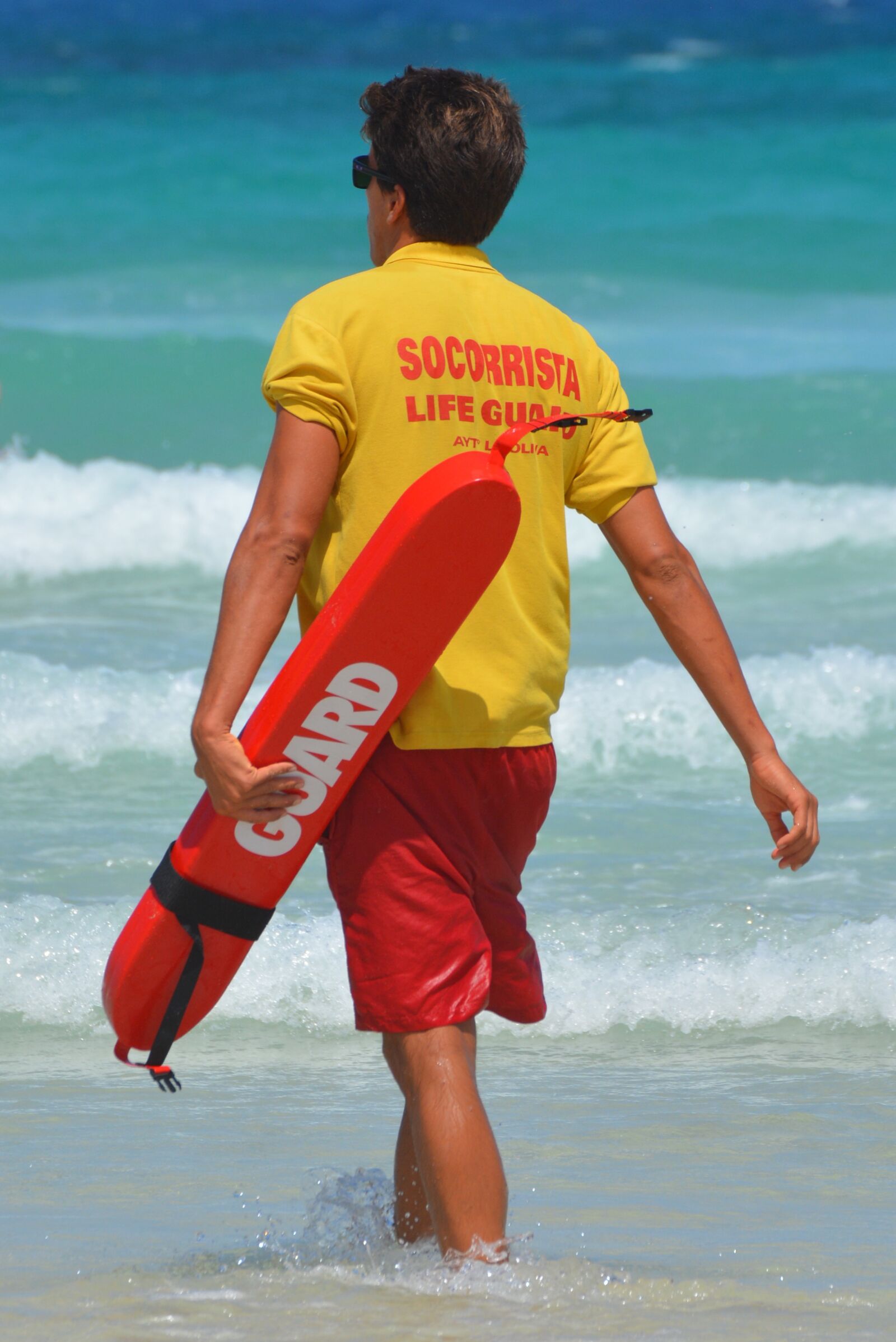 Nikon D5200 sample photo. Rescuer, sea, people photography