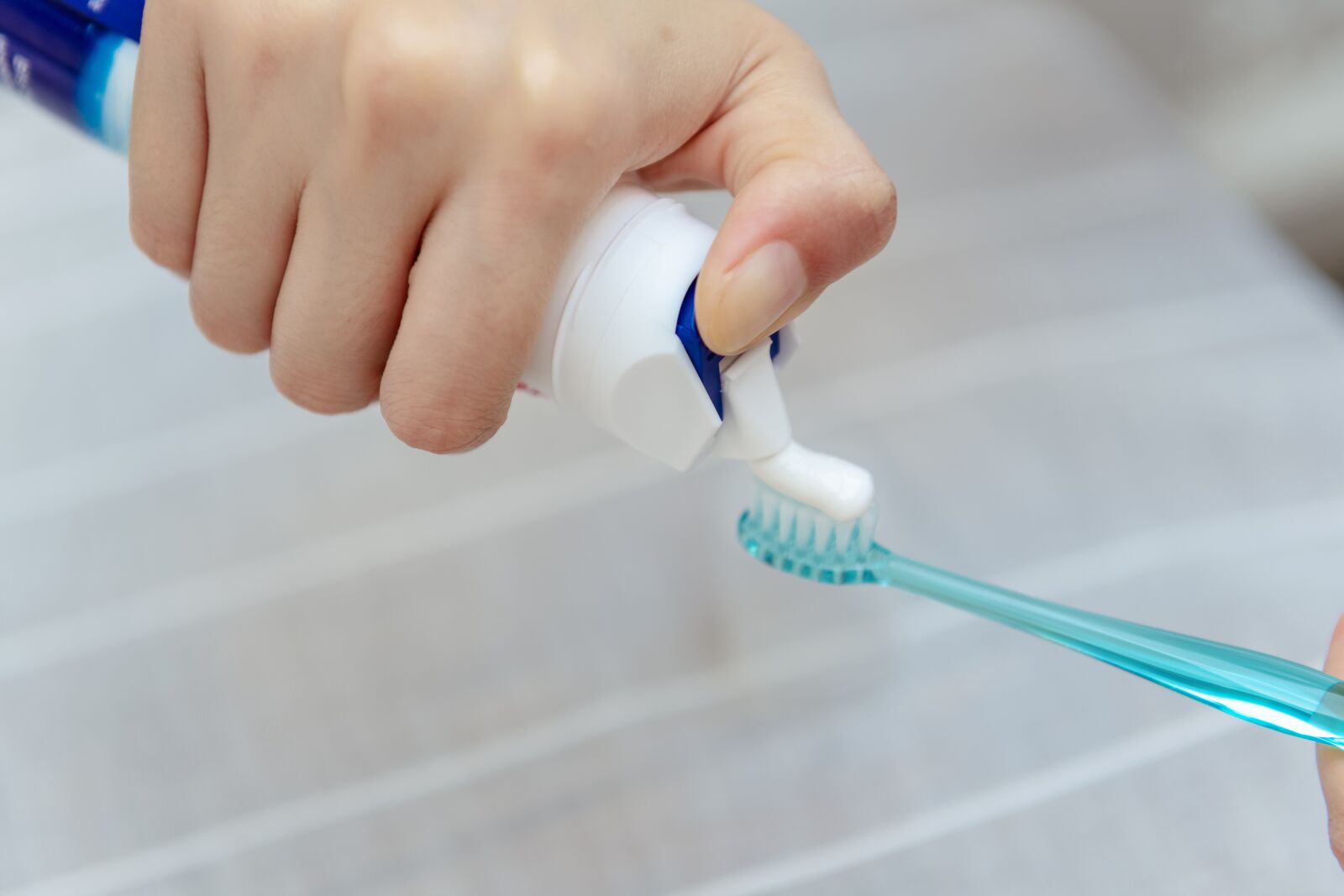 Nikon D850 sample photo. Hand, toothpaste, toothbrush photography